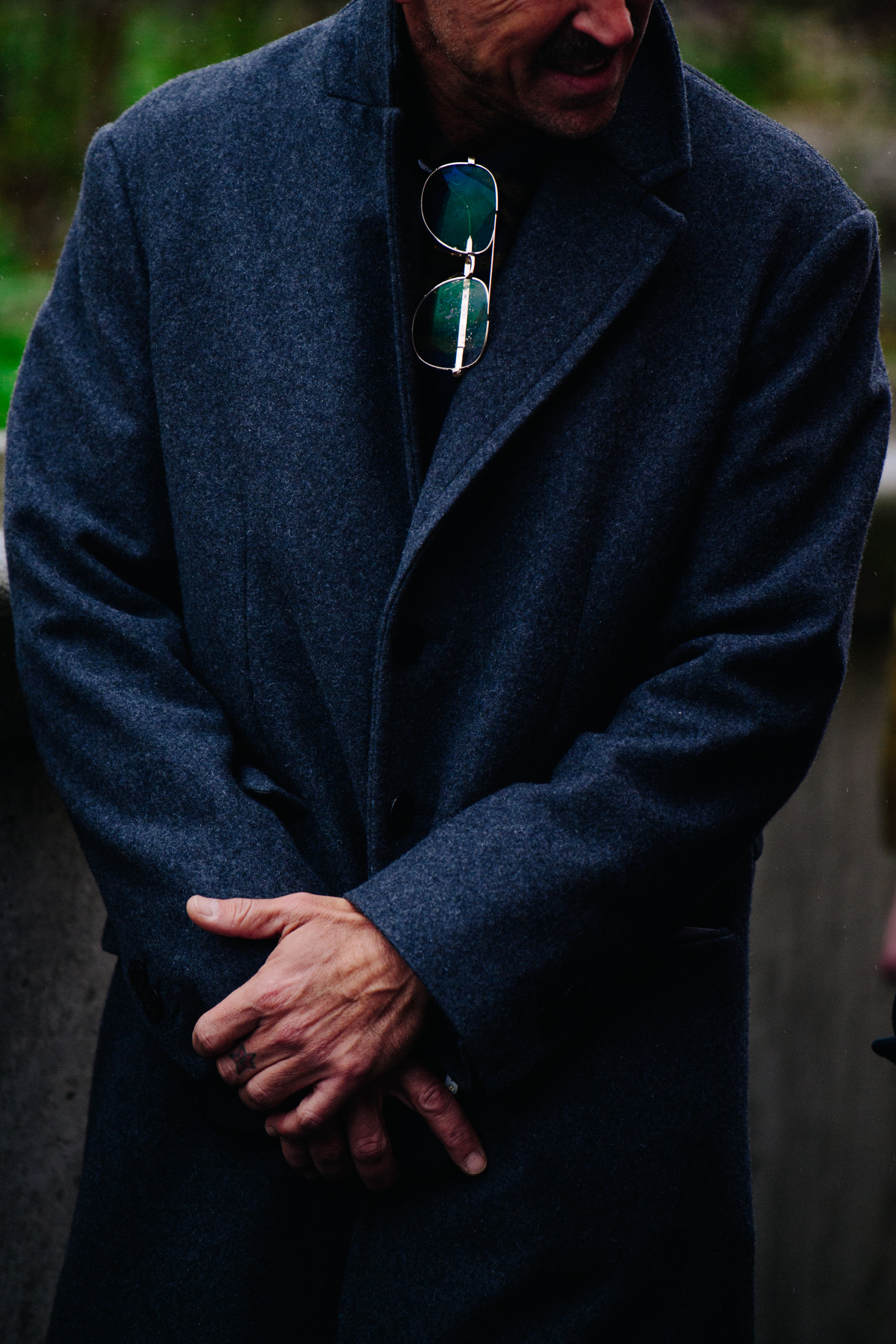 Man wearing grey wool coat