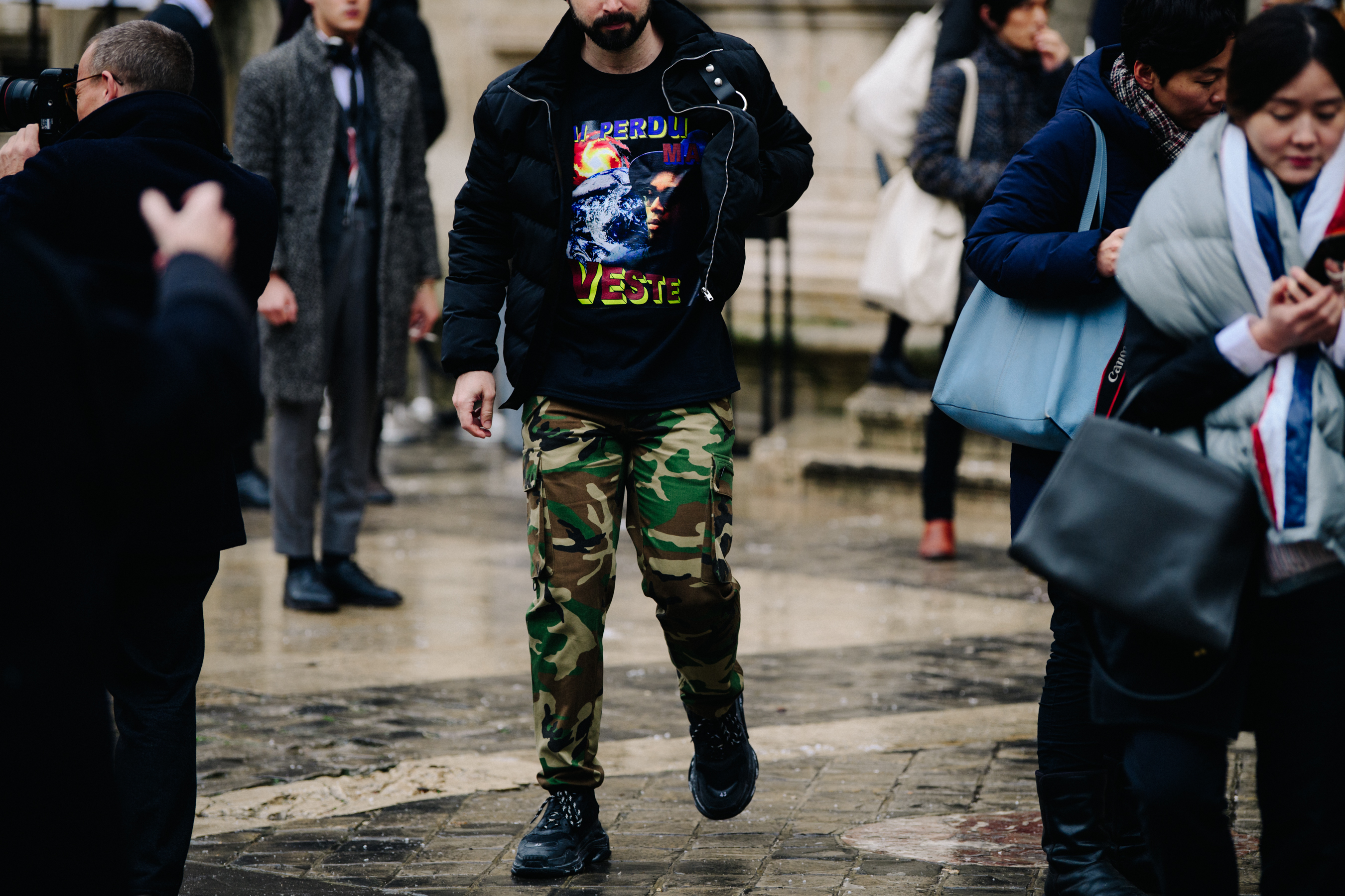 American man wearing camouflage pants