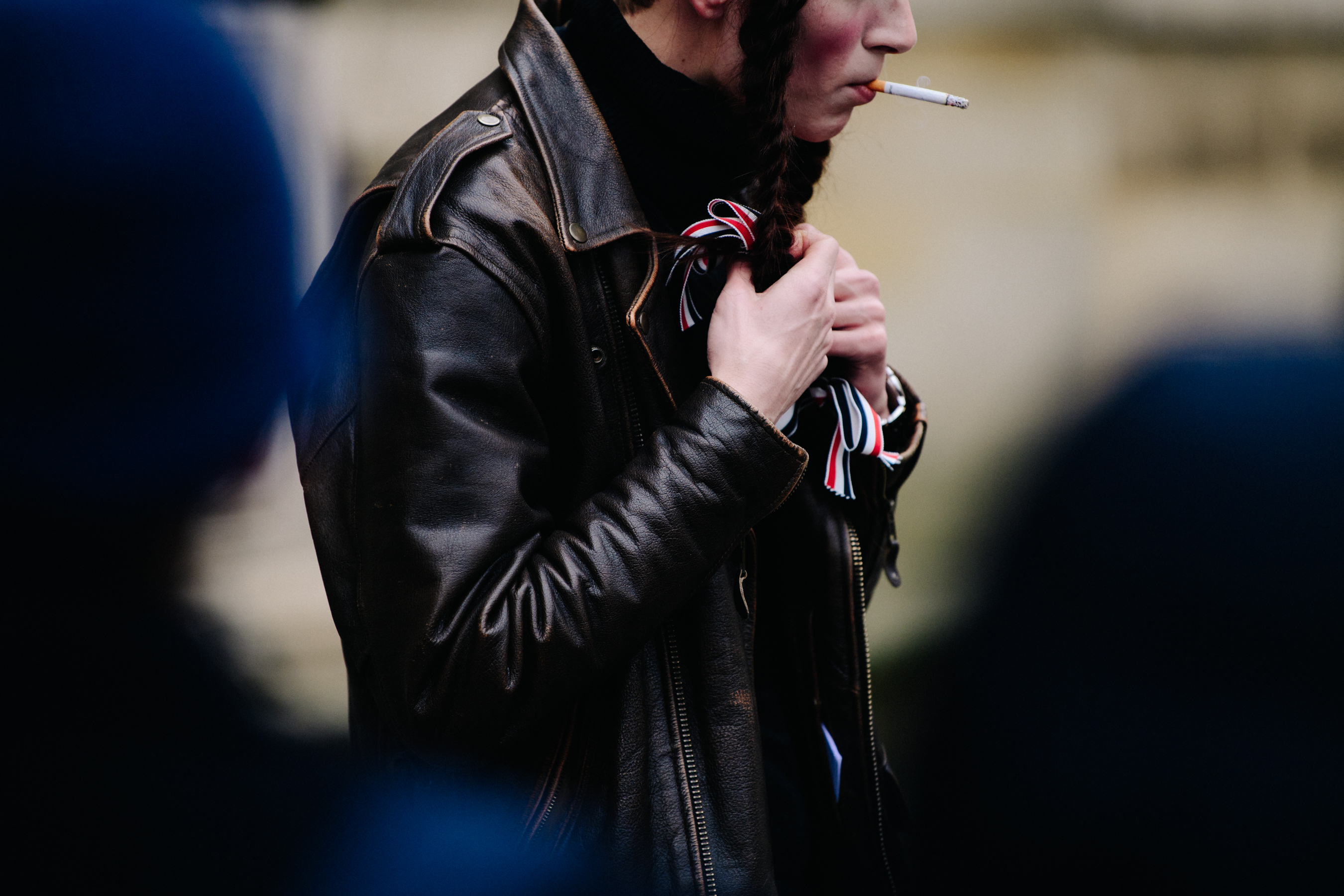 Model smoking after Thom Browne show