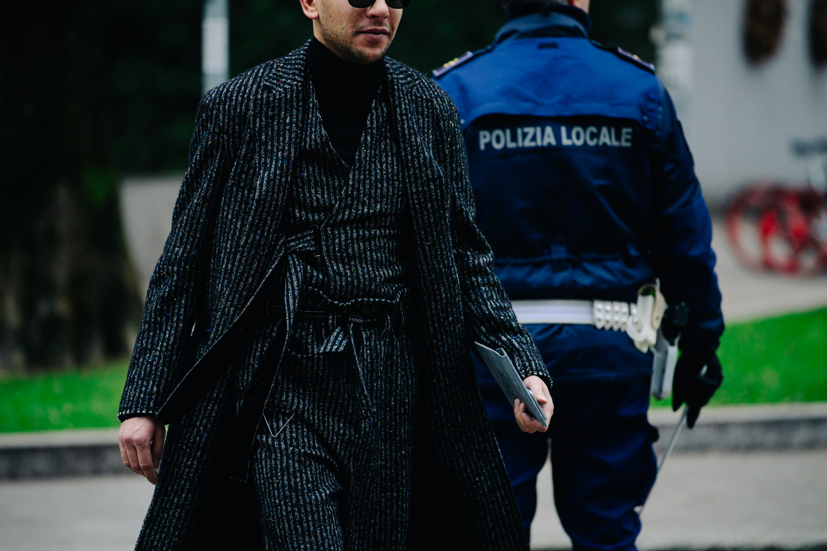 Man wearing long glitter wool coat