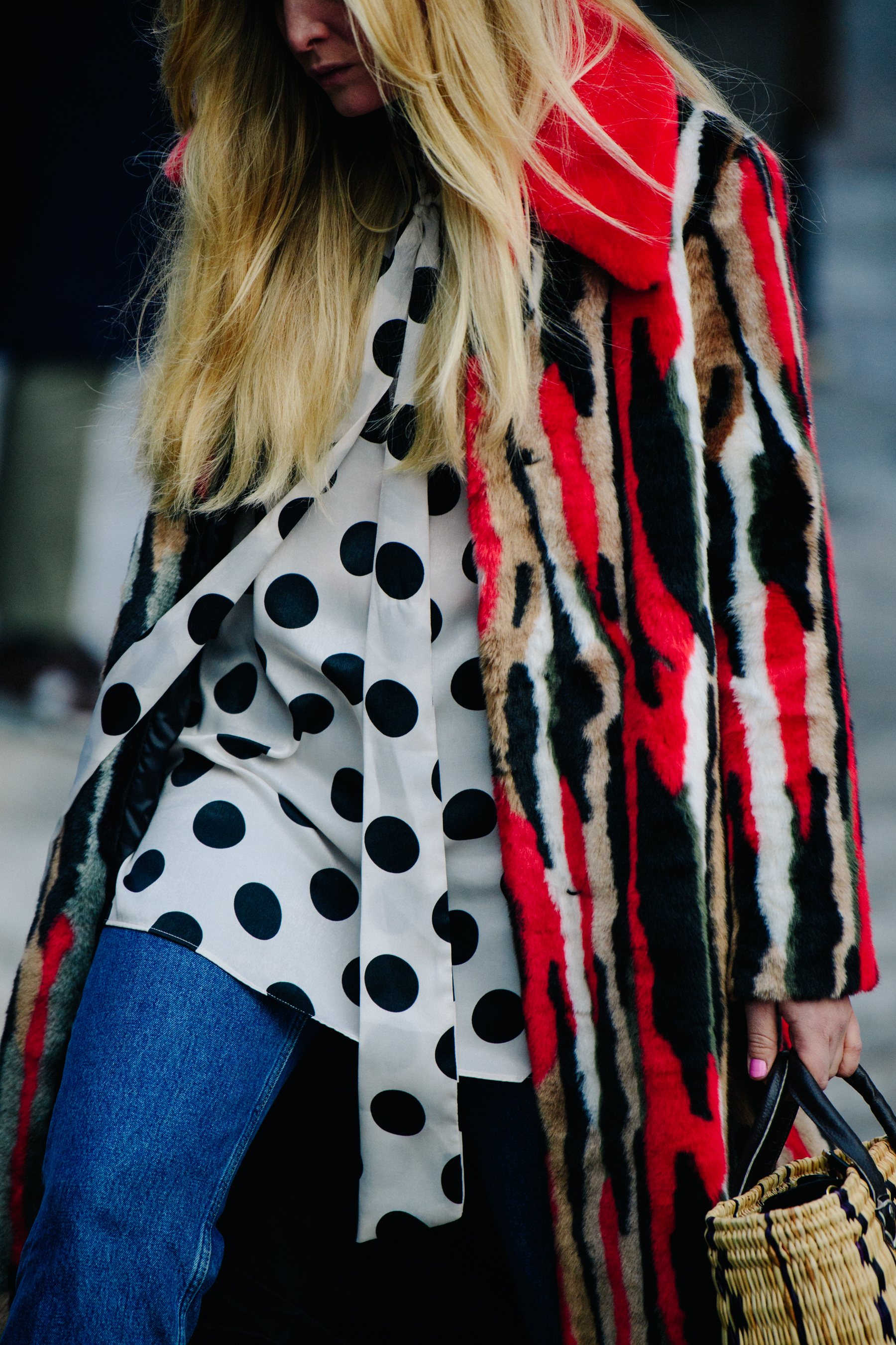 Norwegian editor wearing red fur coat