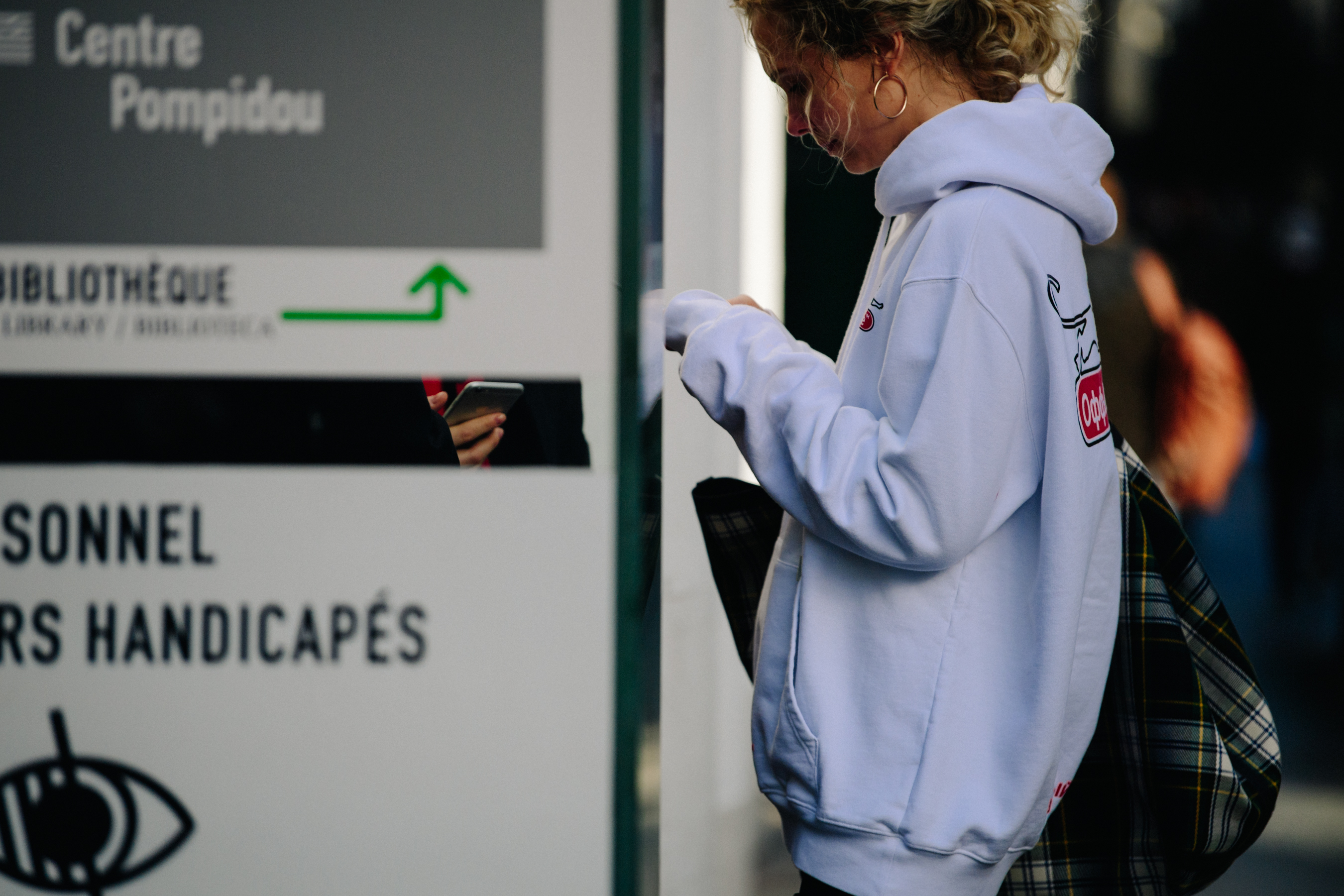 Russian woman wearing white hoodie