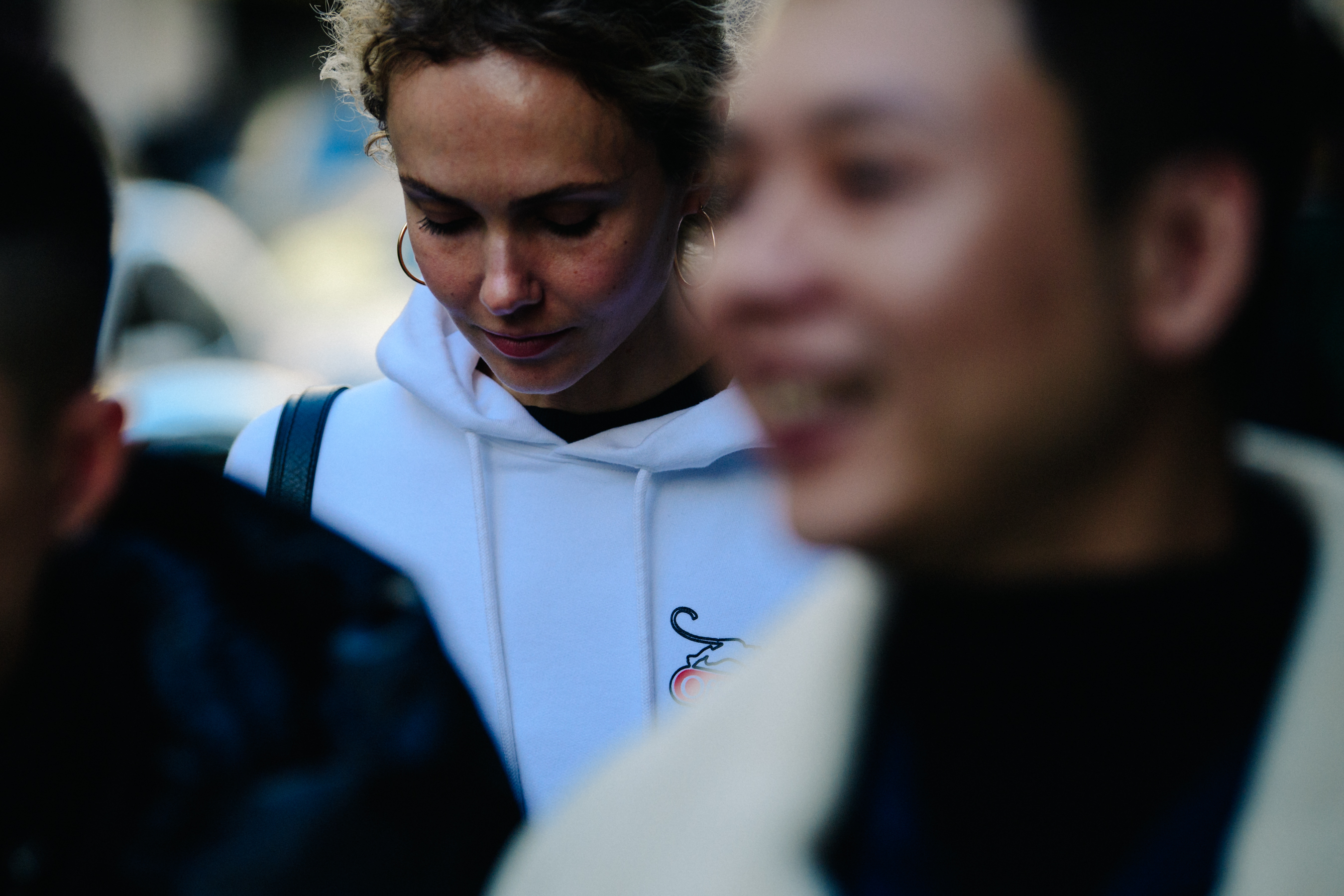 Russian woman wearing white hoodie