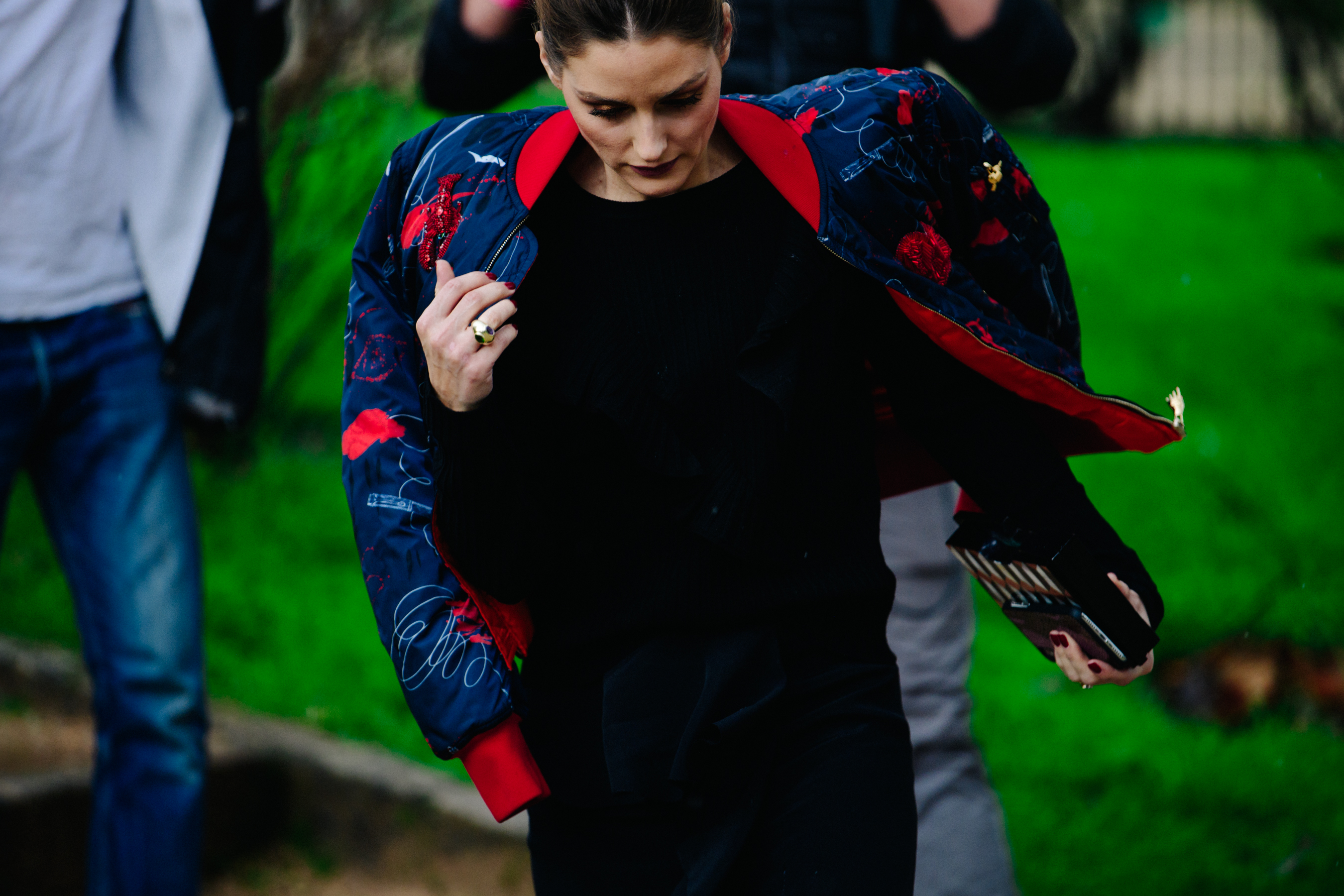Olivia Palermo wearing red and blue jacket