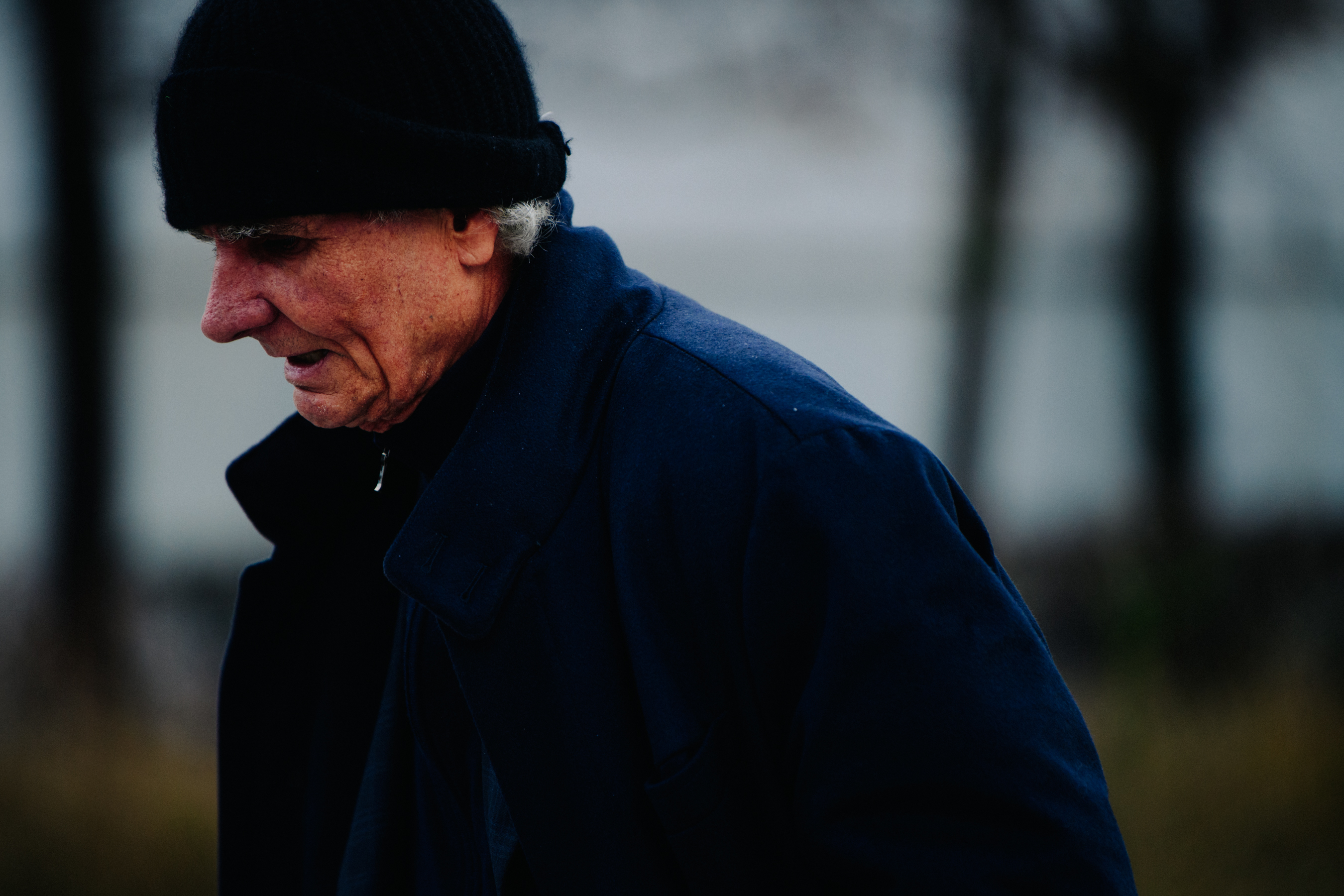 German photographer wearing blue coat