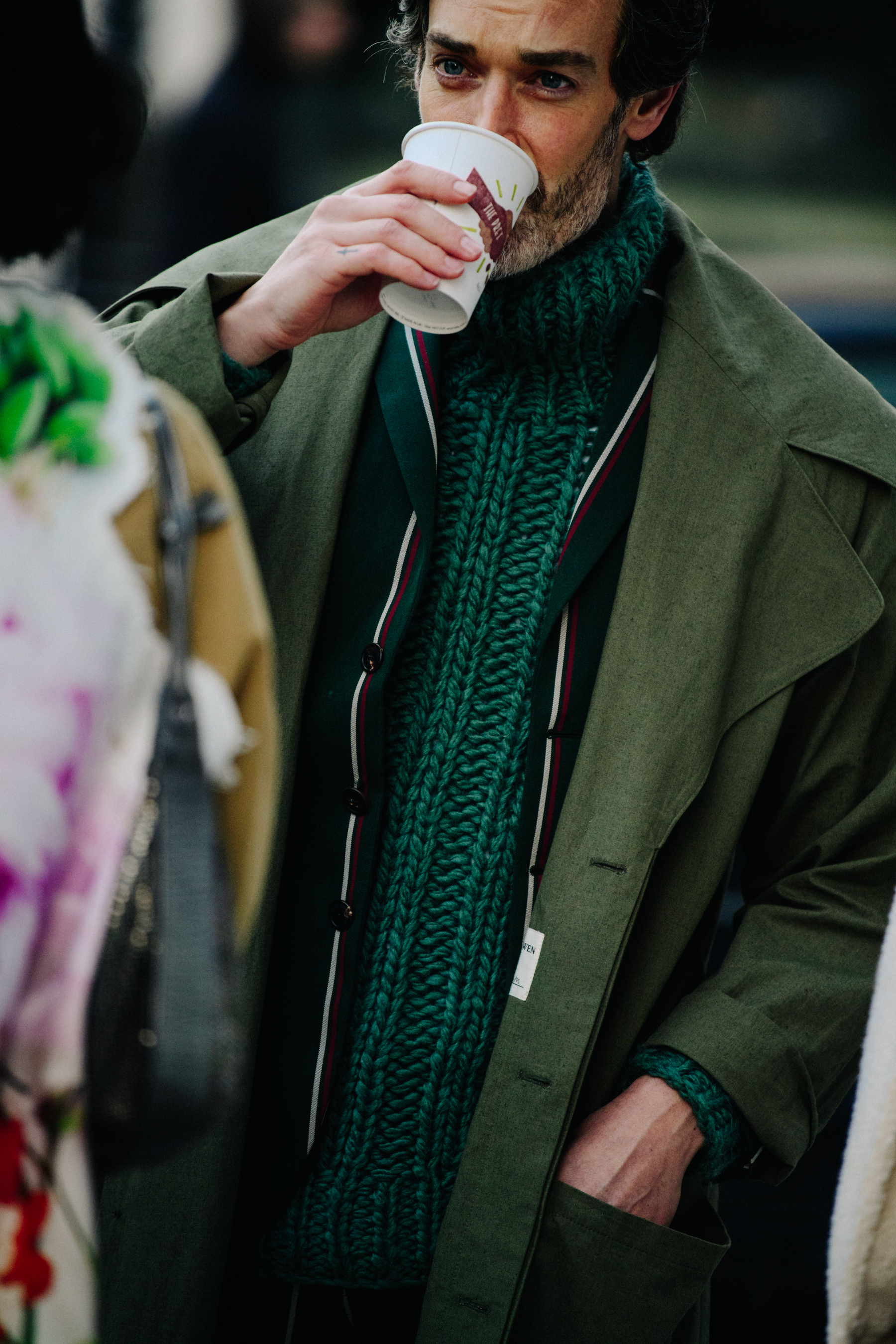 British model wearing green outfit