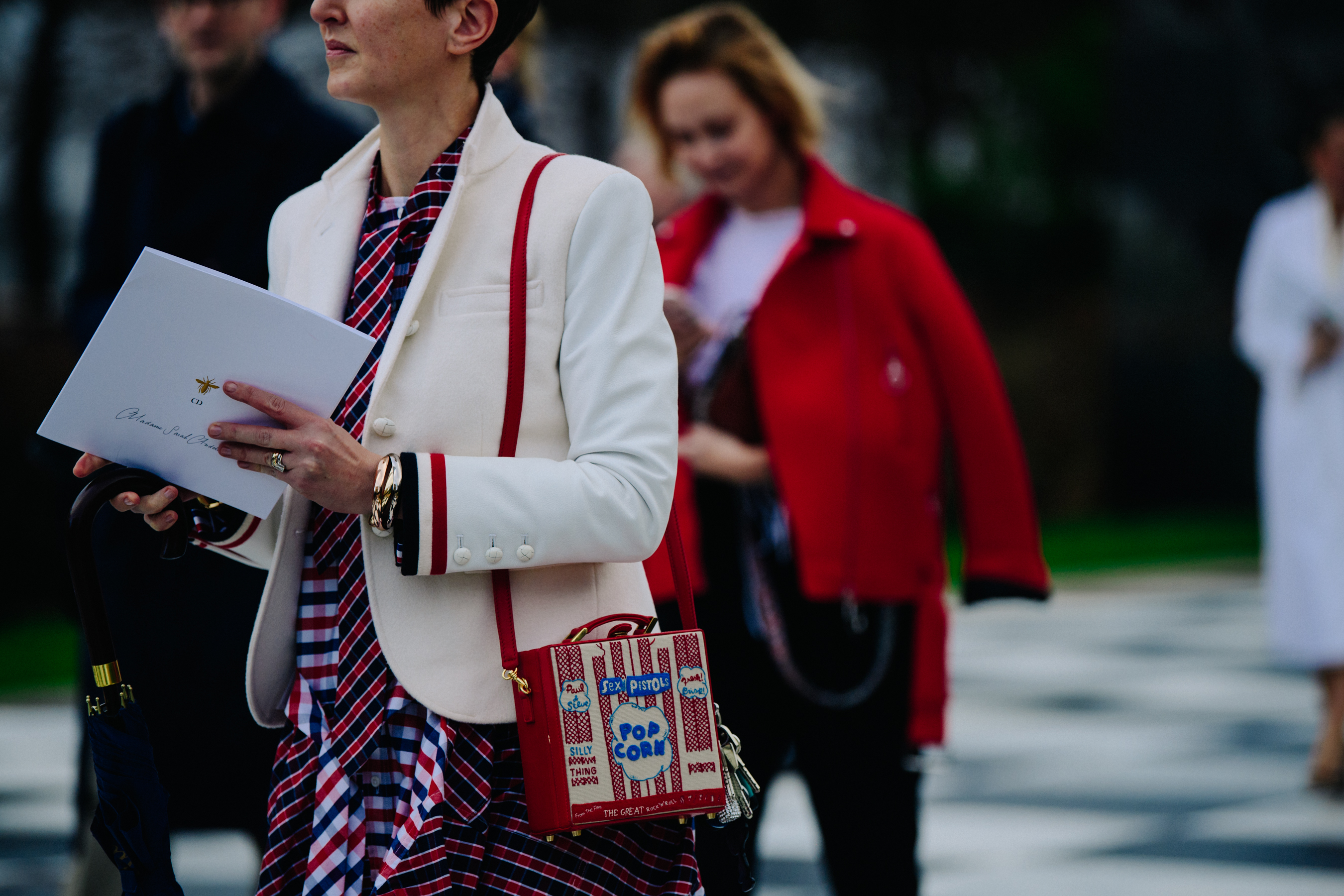 French woman wearing blue and red