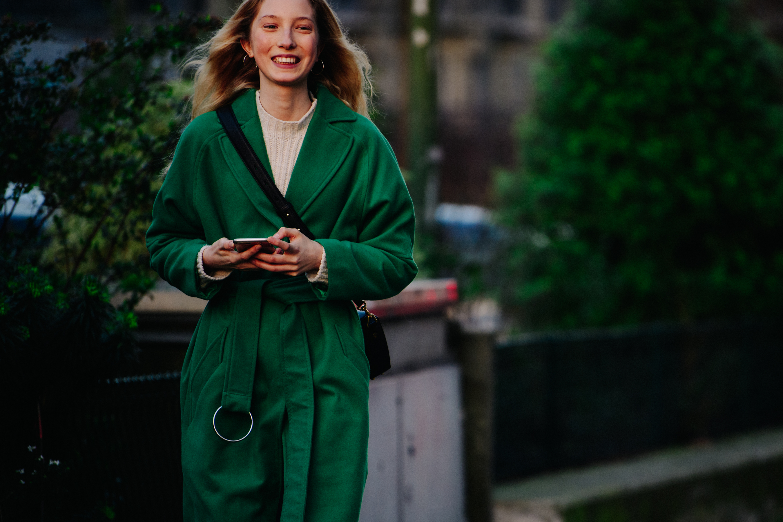 Model wearing green winter coat