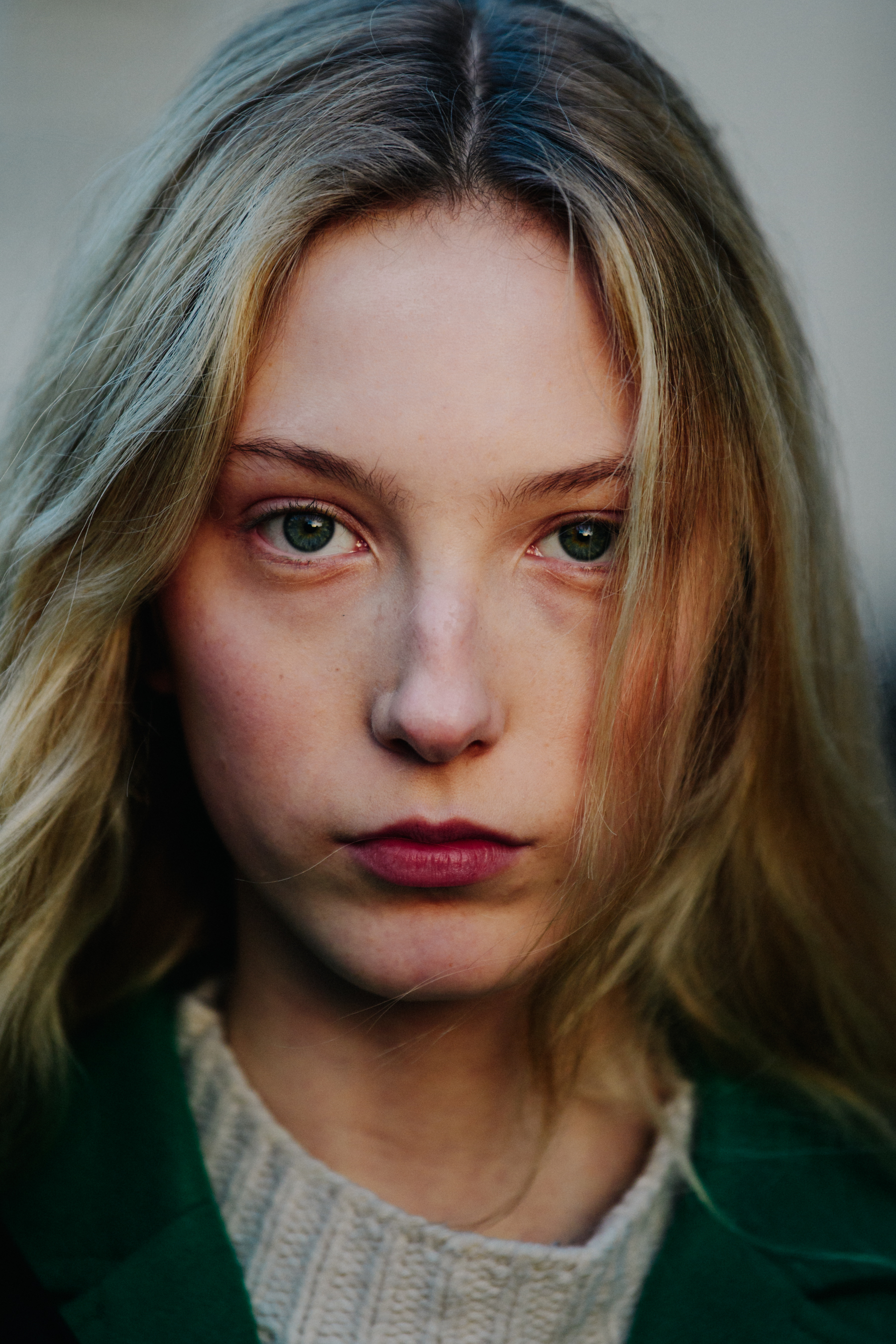 Portrait of Sasha Komarova wearing green