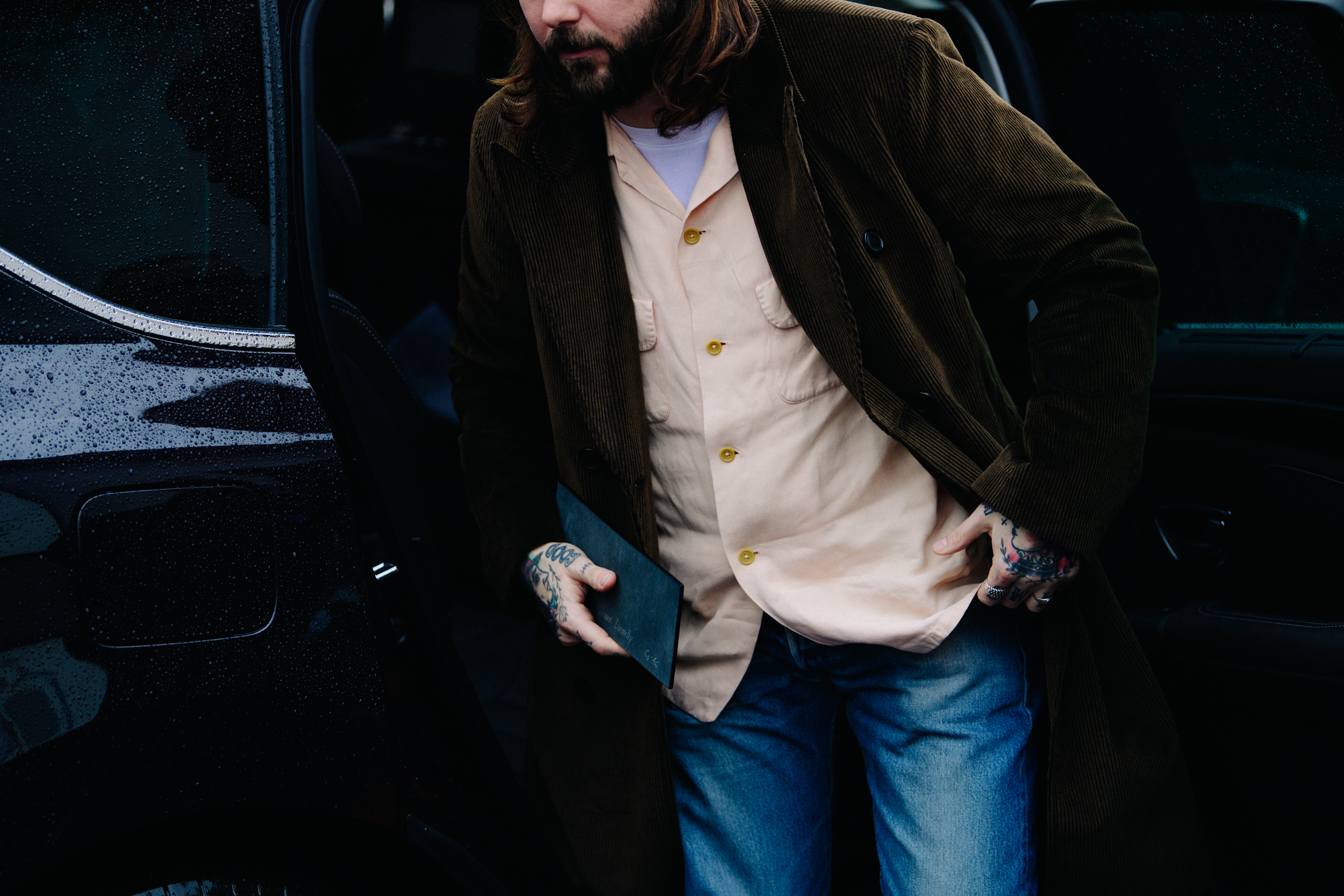 Man wearing pale pink shirt