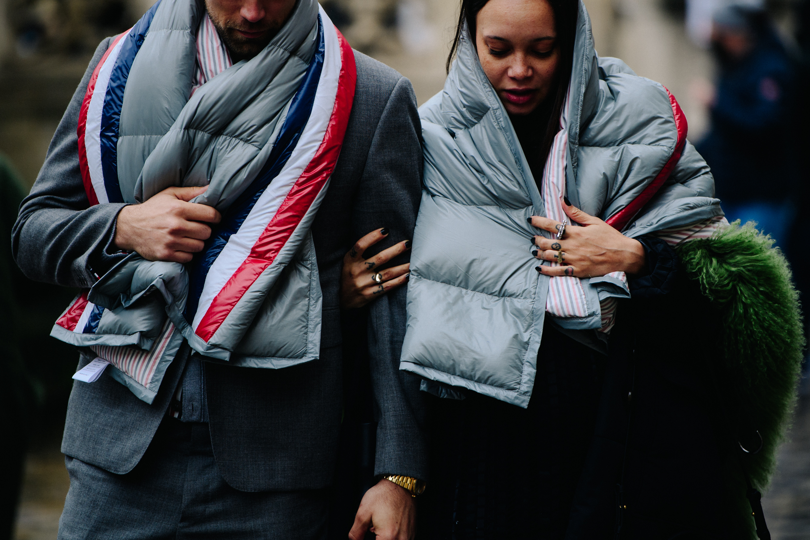 Couple wearing Thom Browne