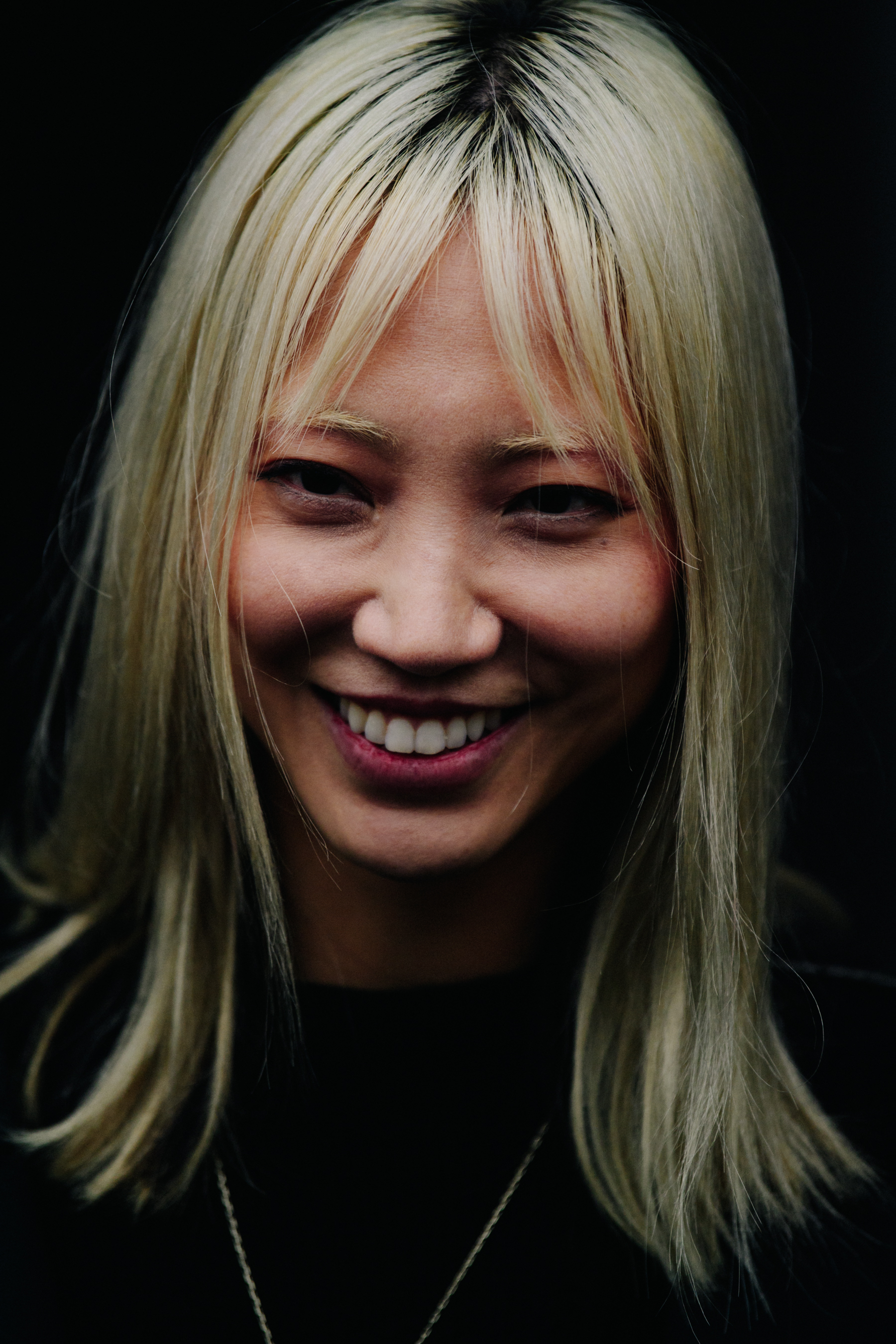Portrait of Asian model with blonde hair