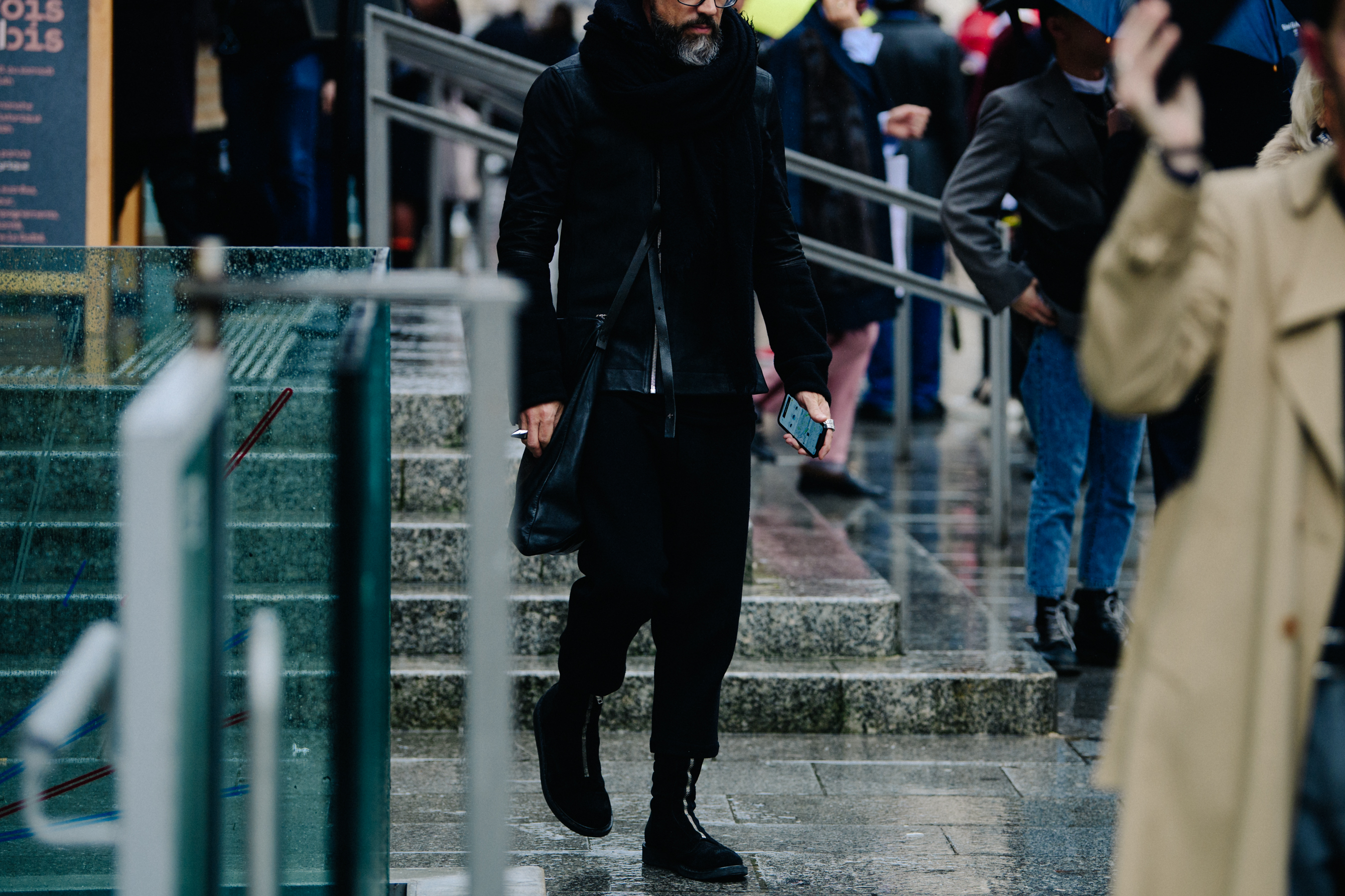 Man wearing zip up black boots
