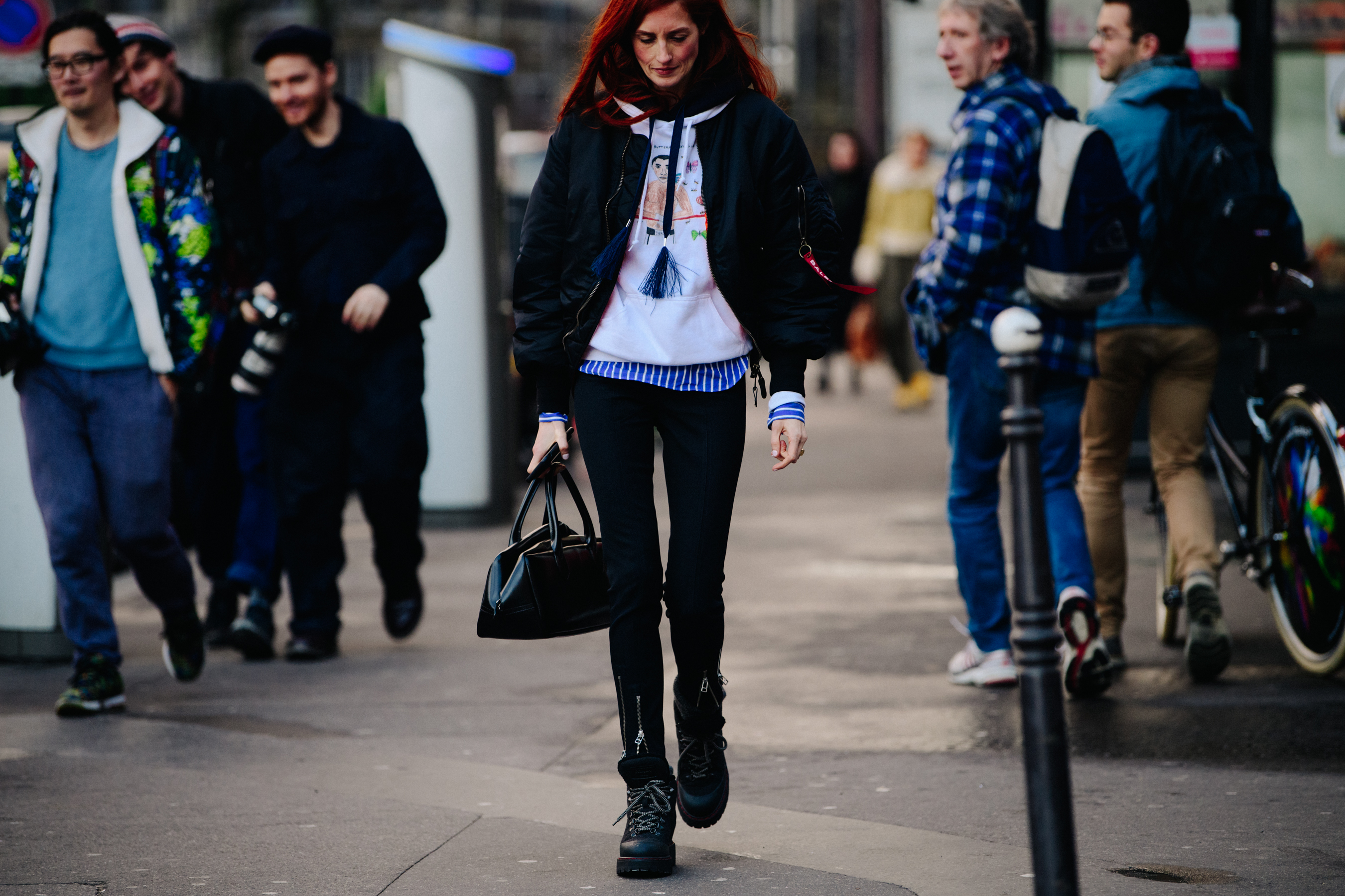 American woman wearing white hoodie