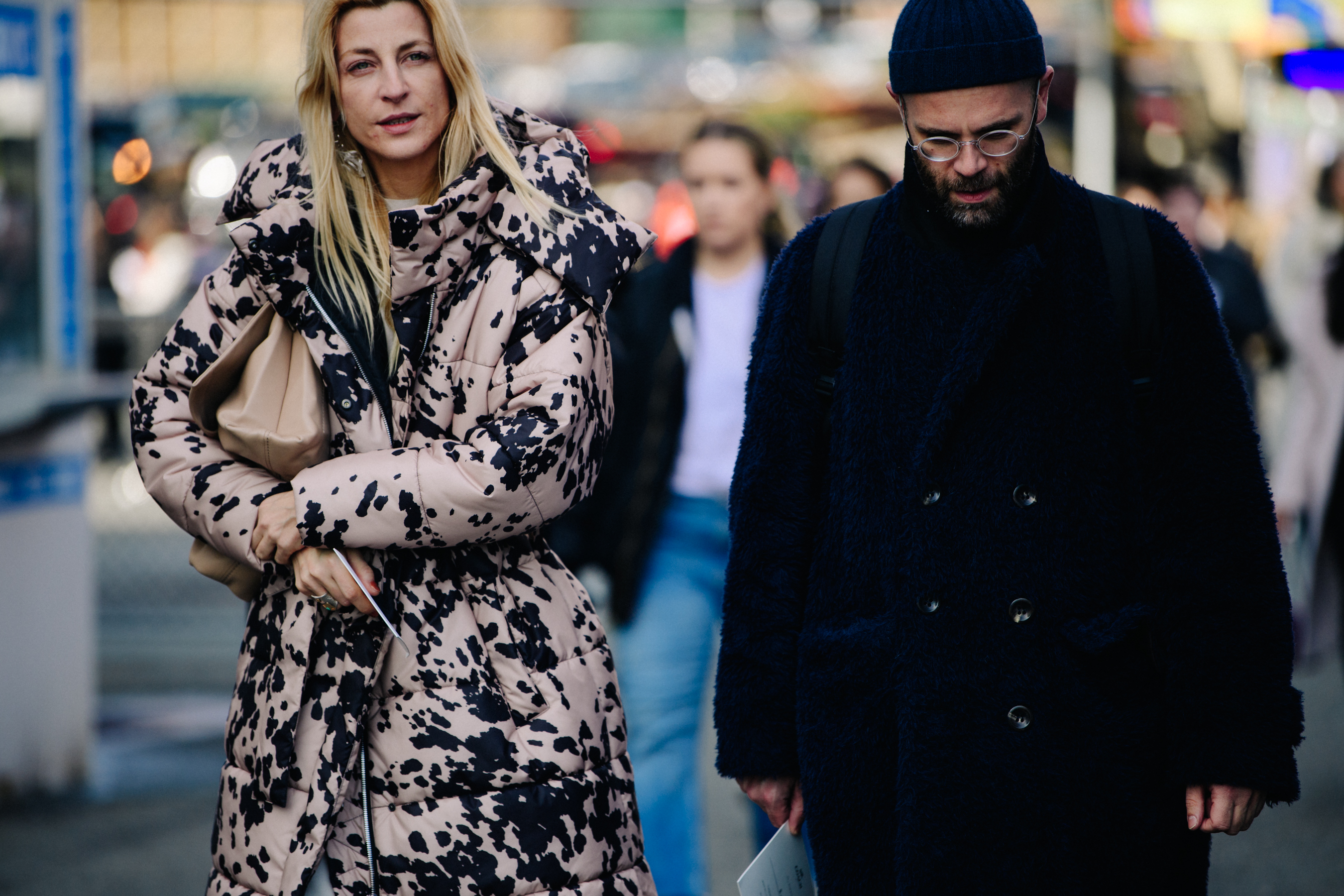 Couple wearing long winter coats