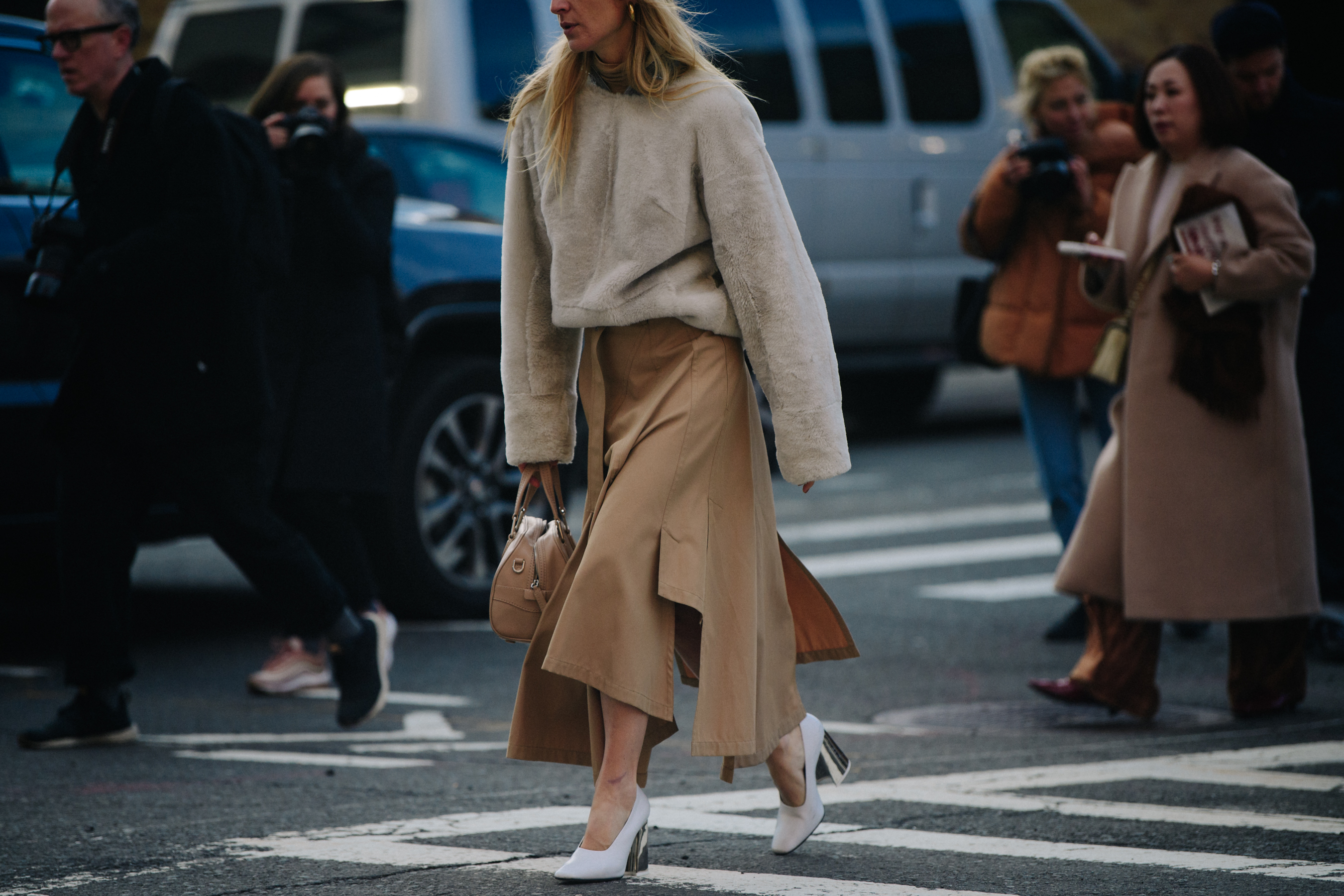 Woman wearing long tan skirt