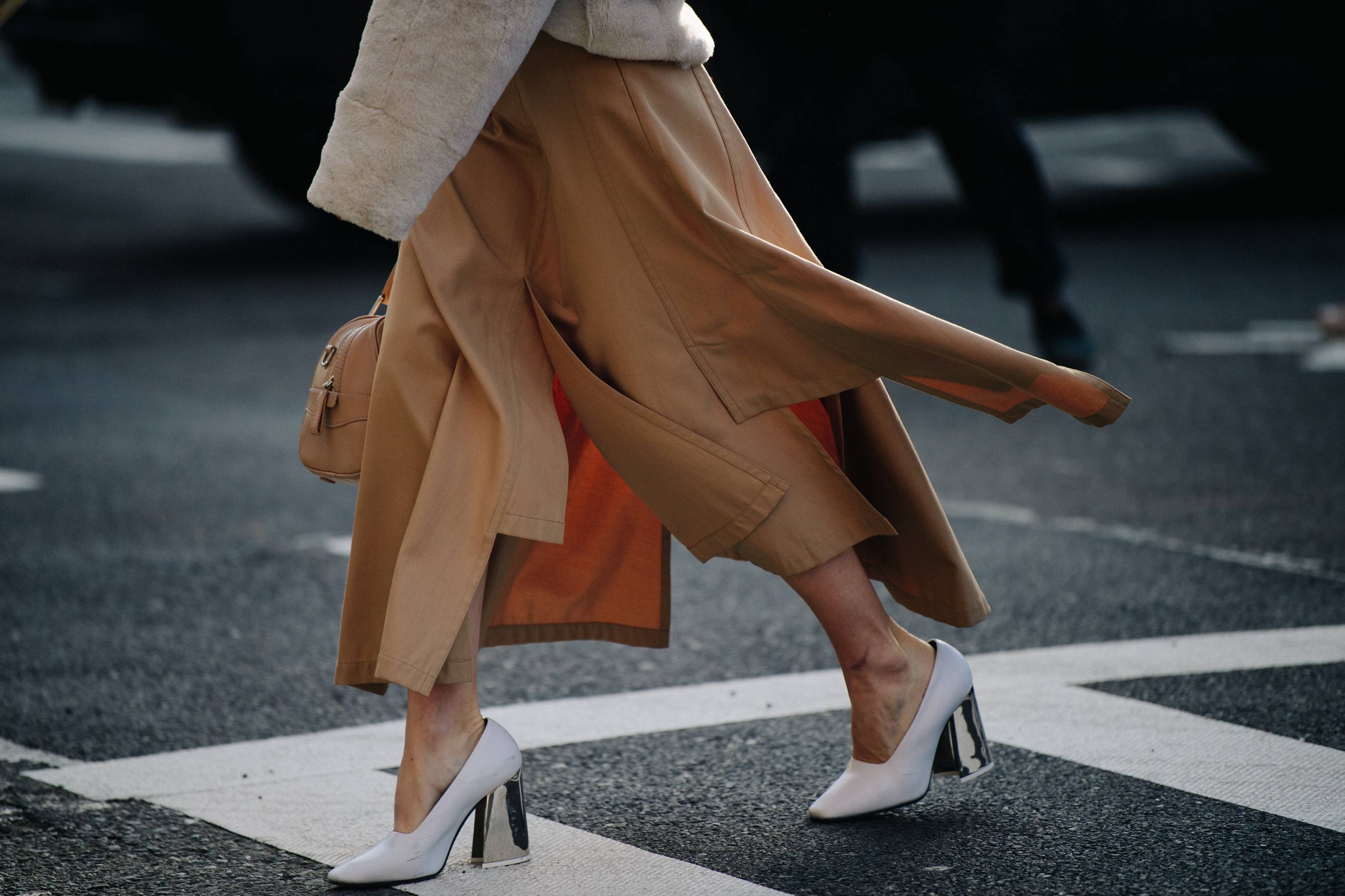 Woman wearing long tan skirt