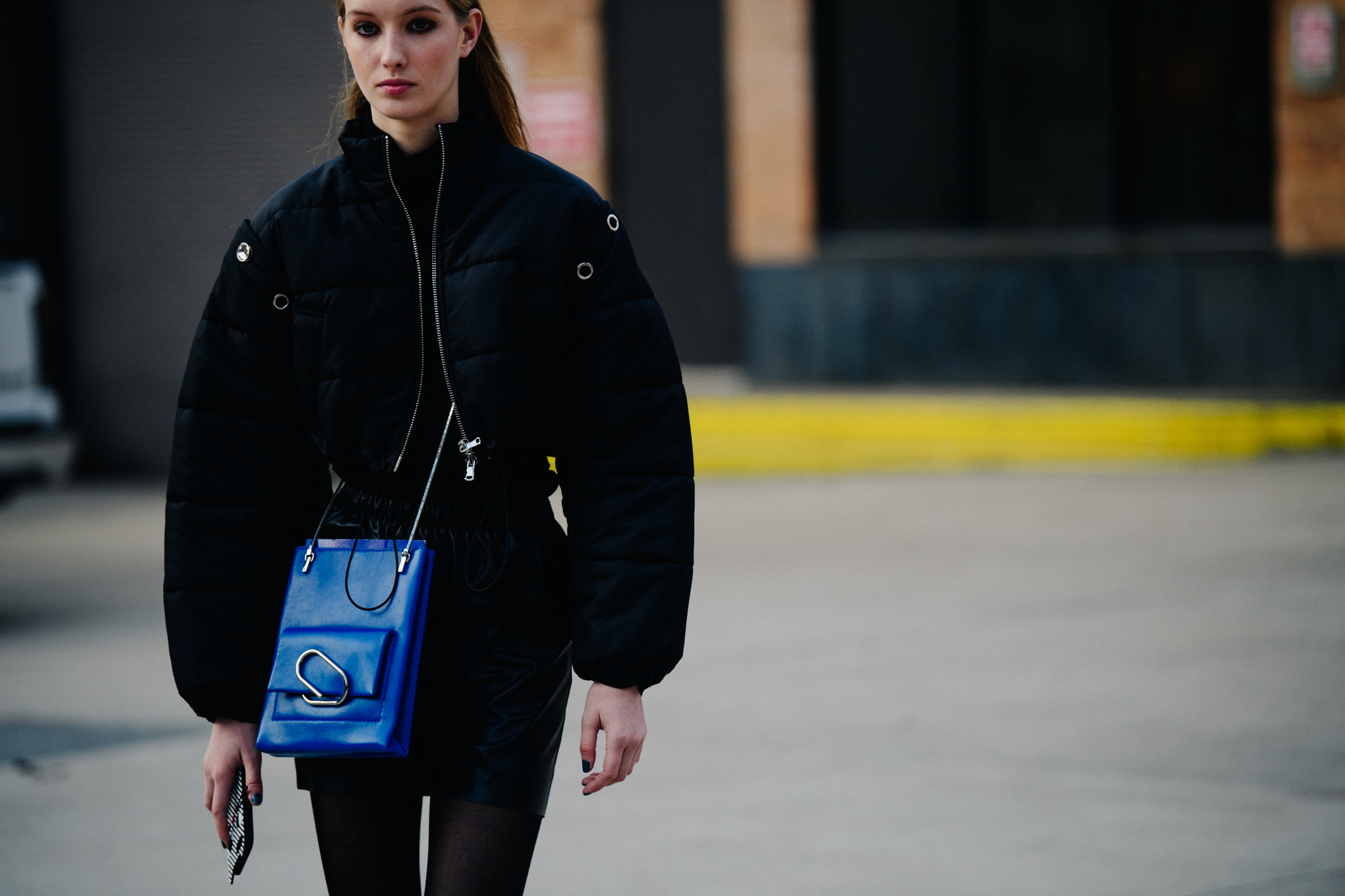 Woman wearing black puffer coat
