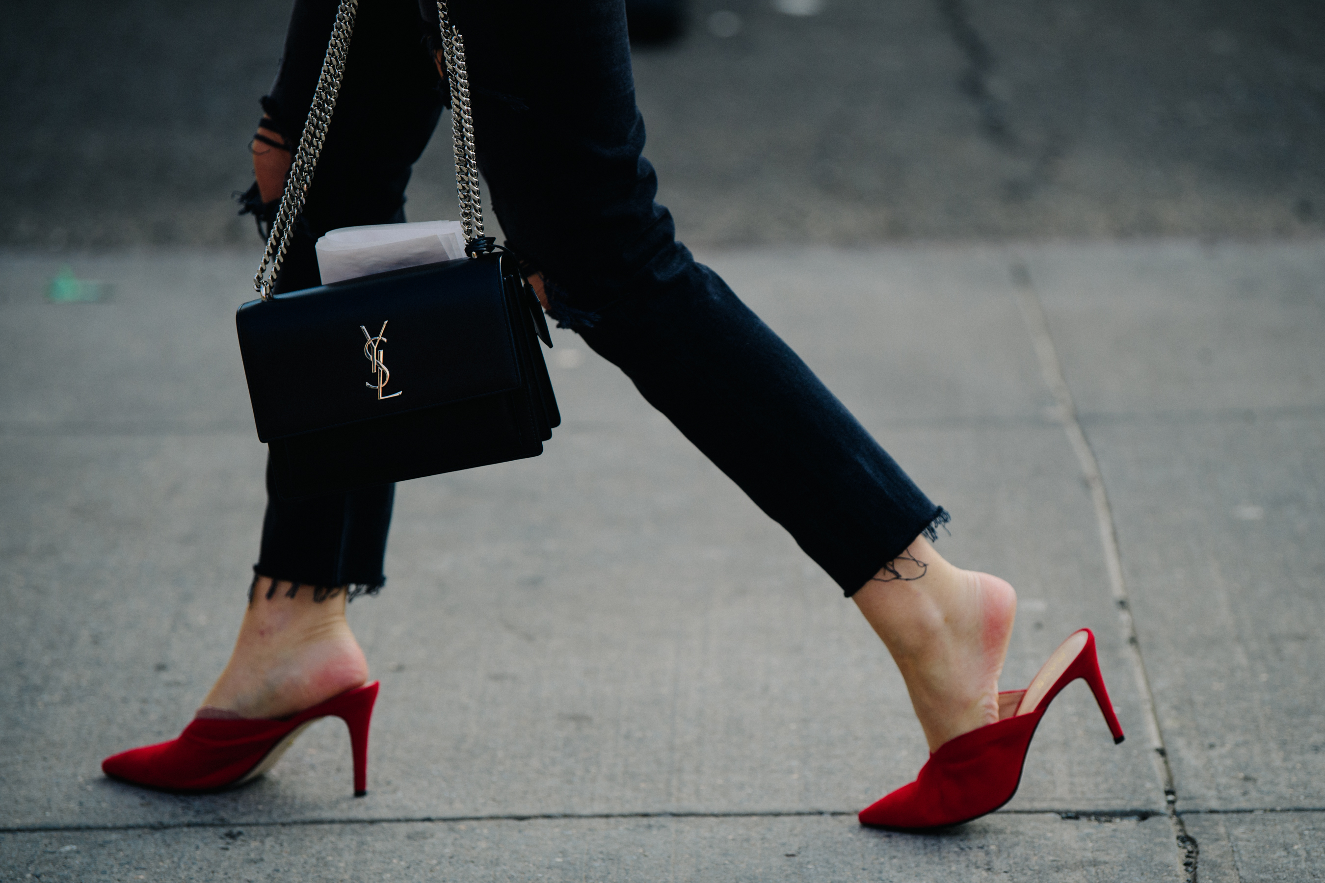 Woman wearing red heel shoes
