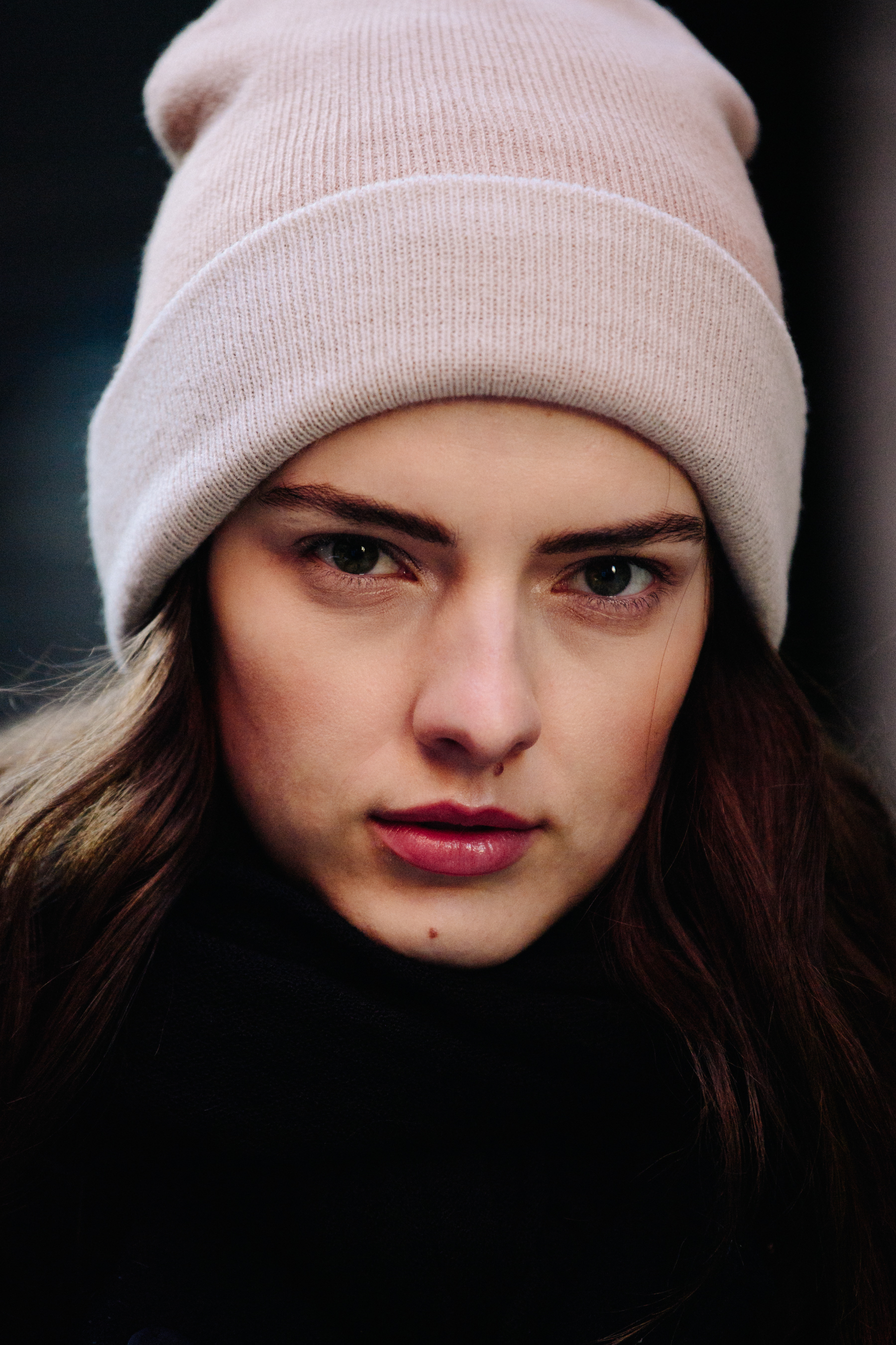 Portrait of model wearing light beanie