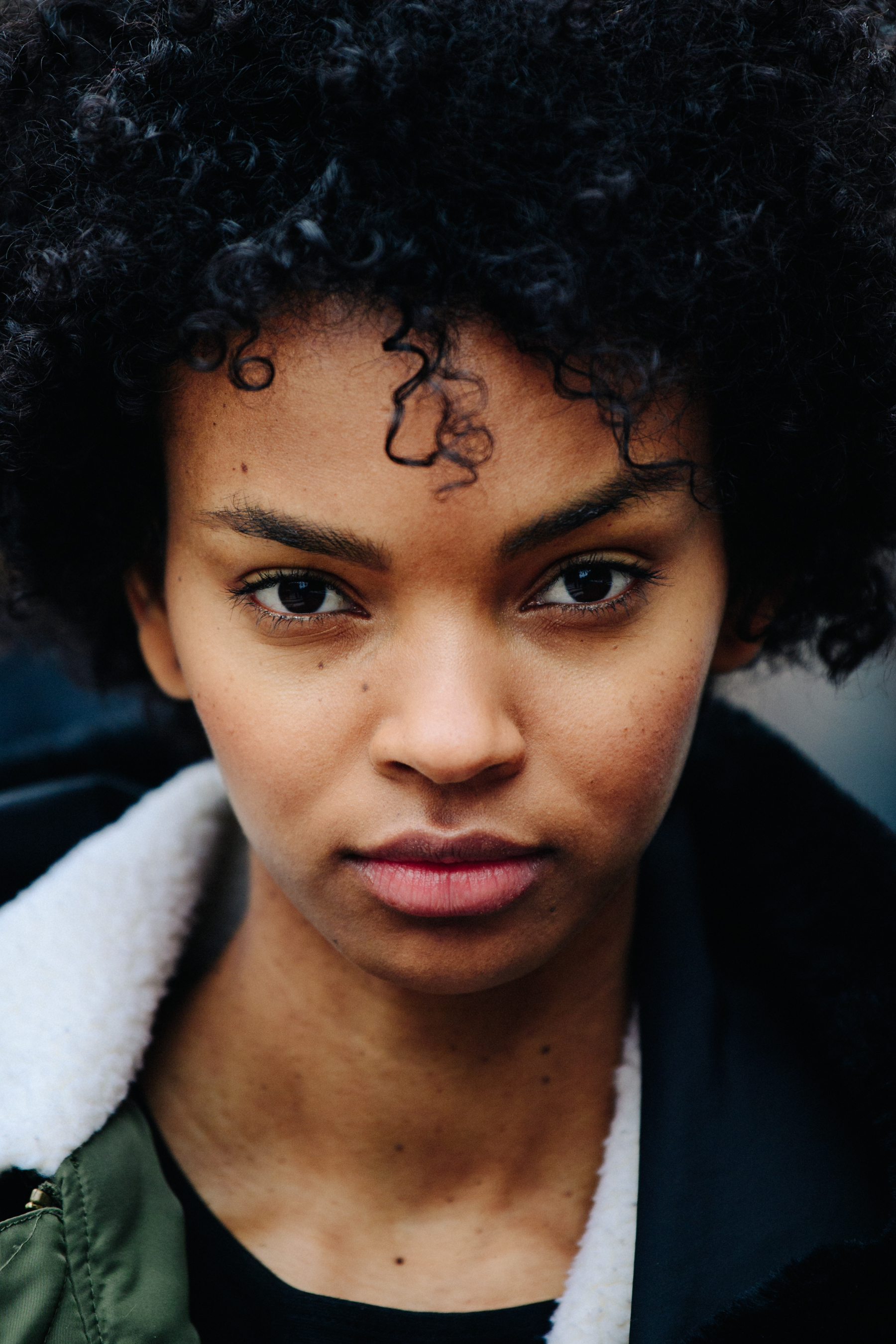 Portrait of model with big curly hair