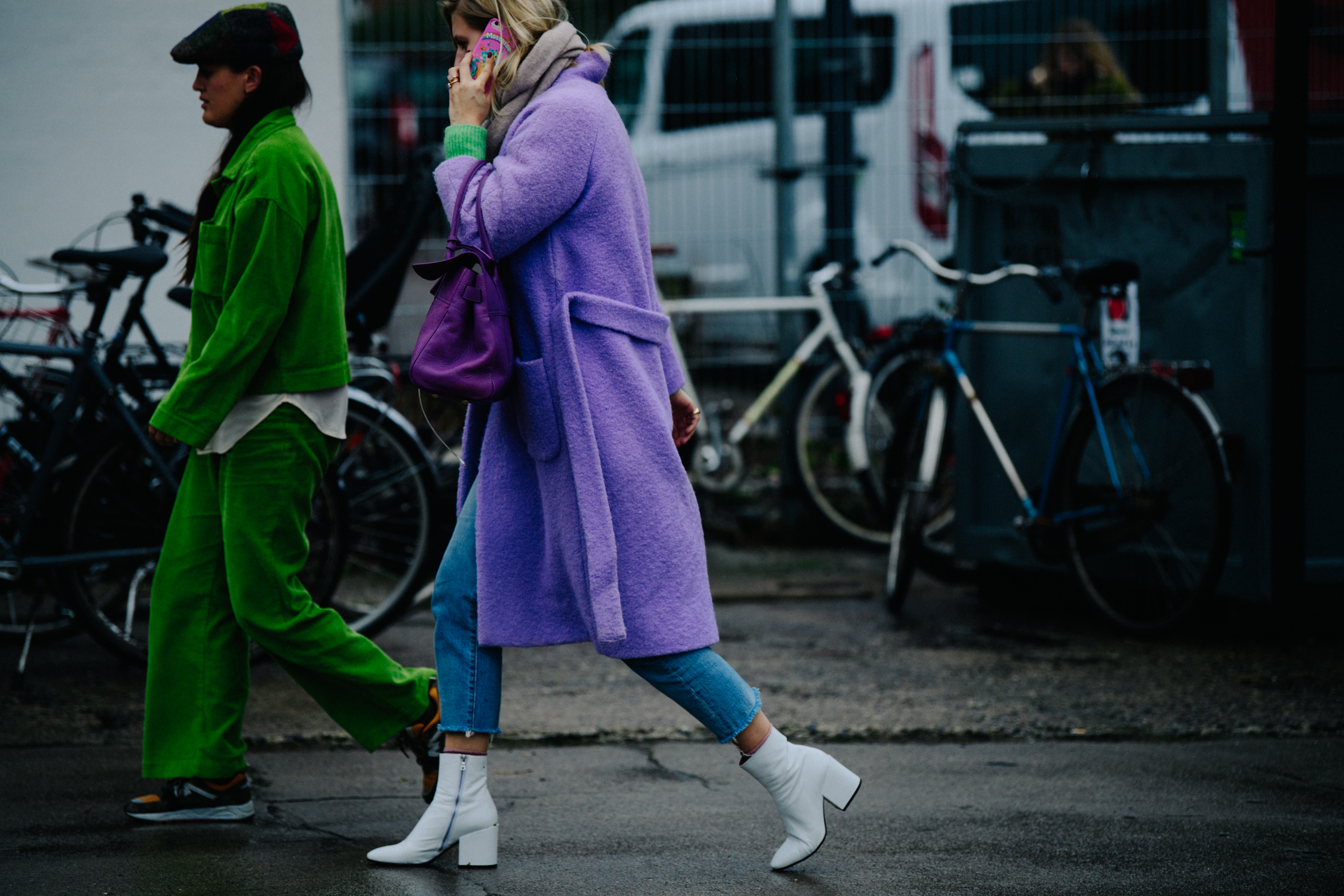 Two women wearing colourful outfits