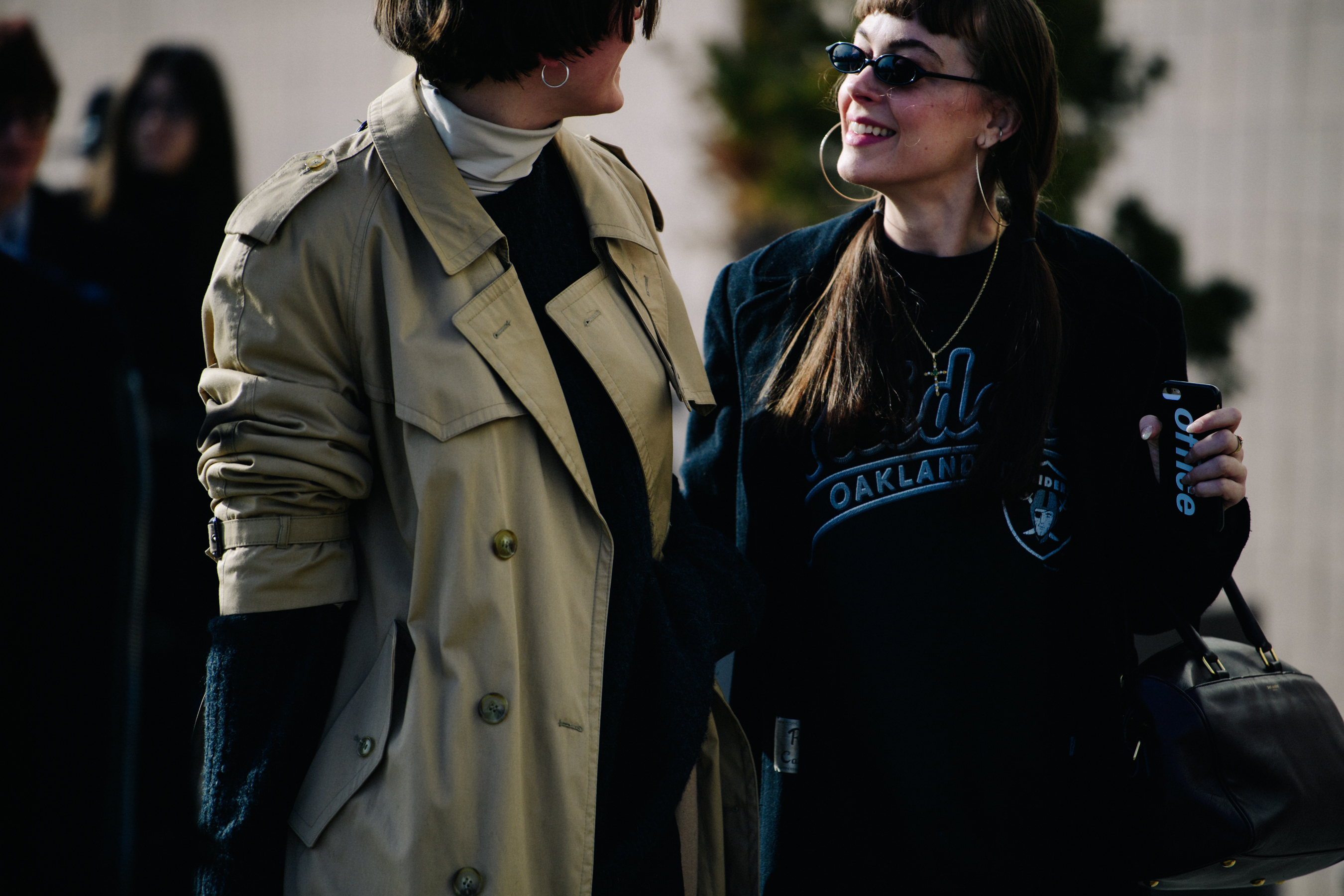 Couple wearing black and tan coats