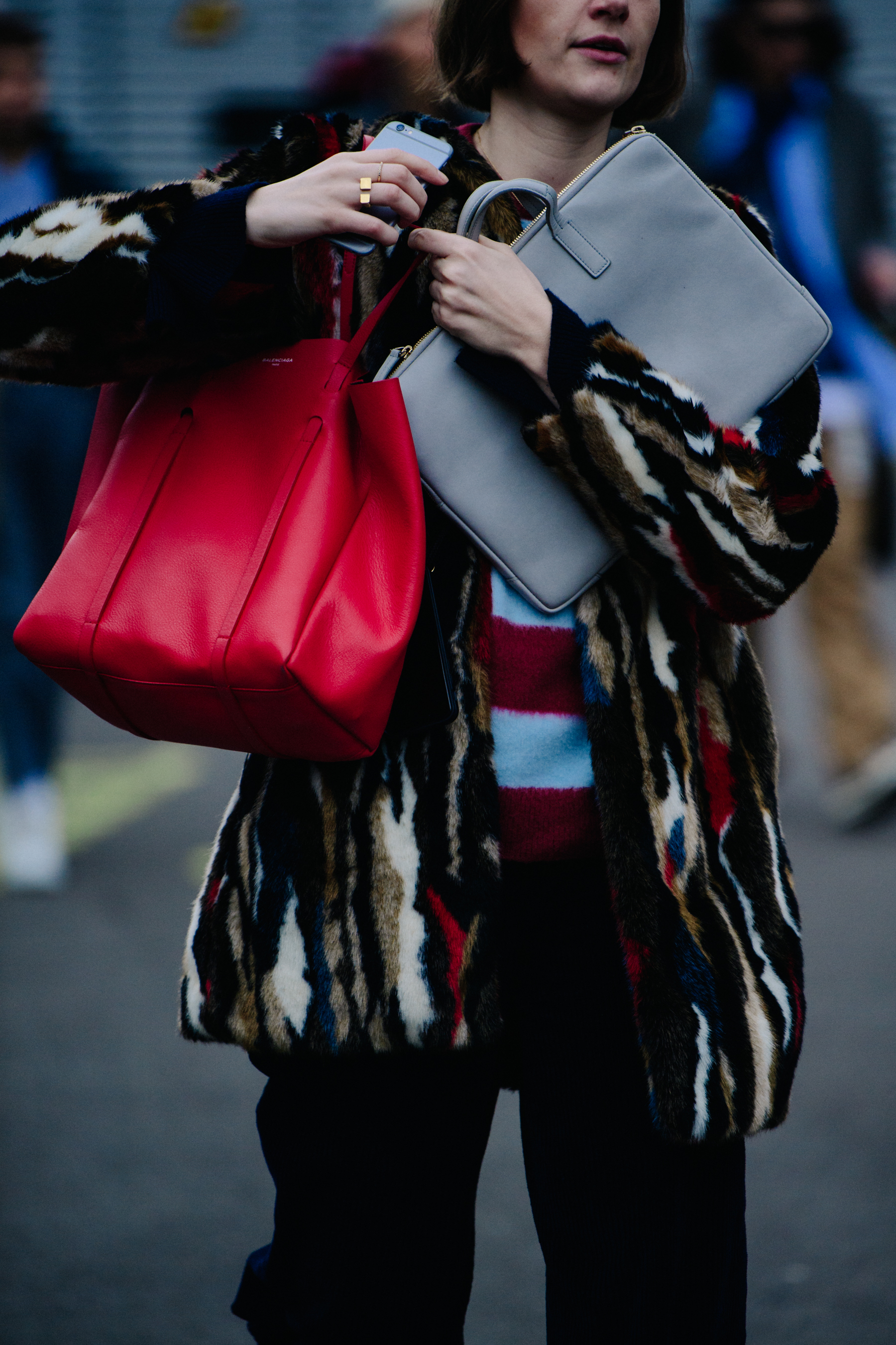 Woman wearing colourful fur coat