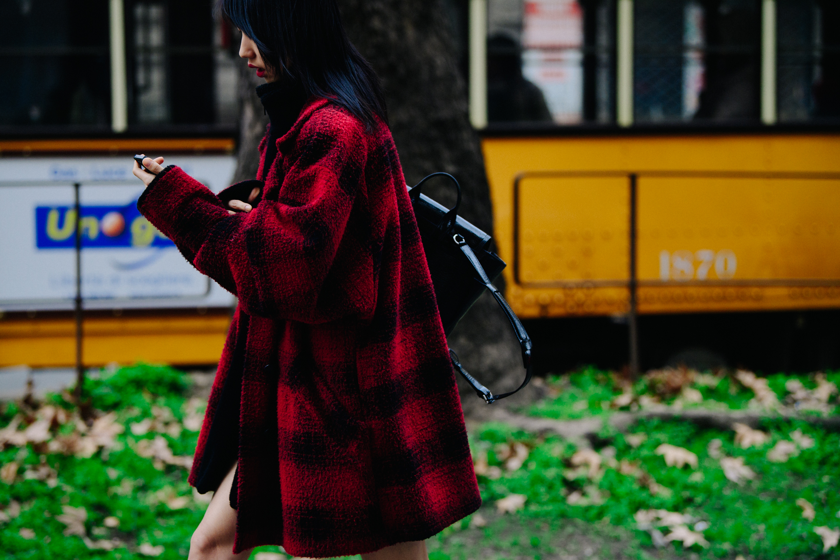 Model wearing red check shirt