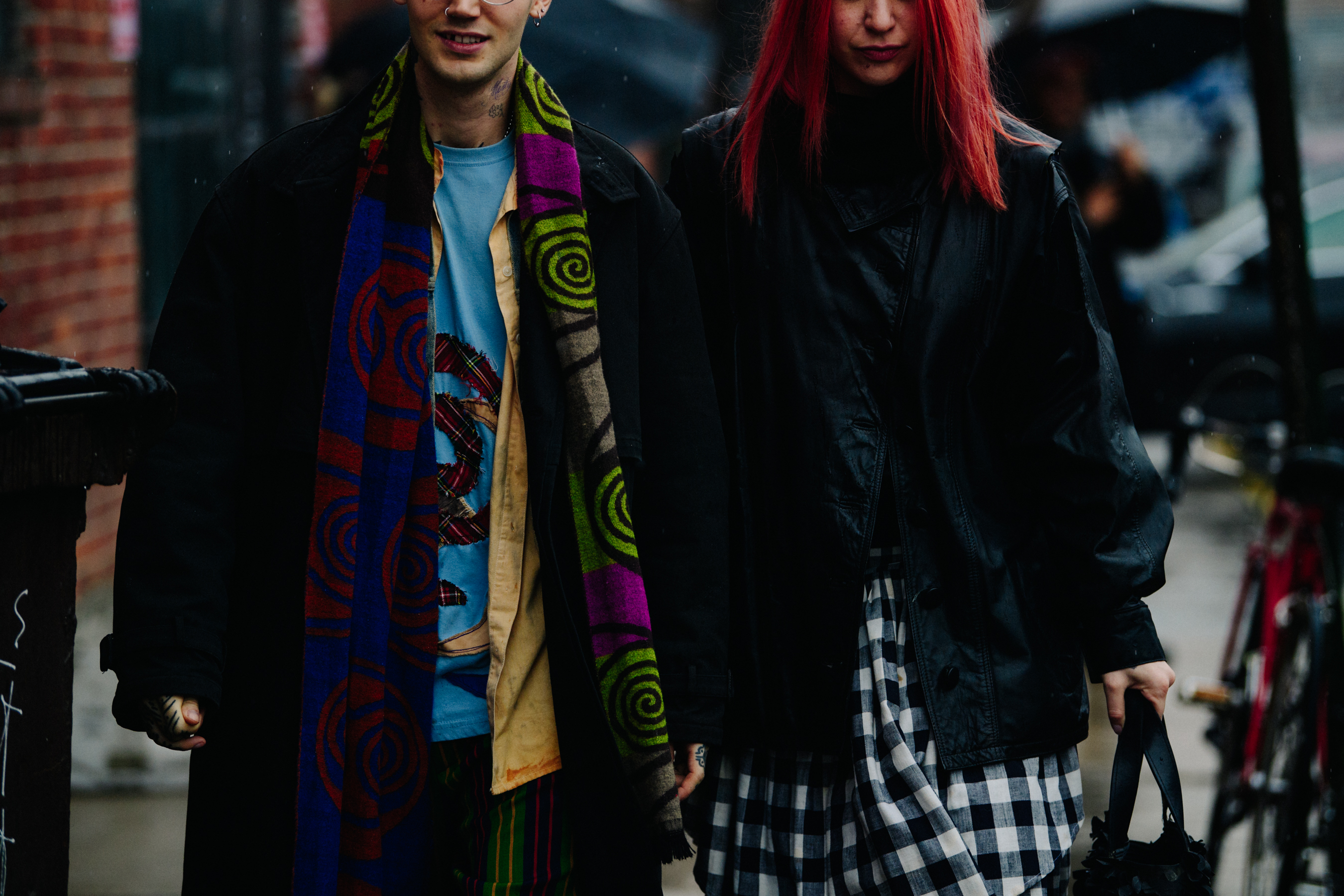 Couple wearing black coats