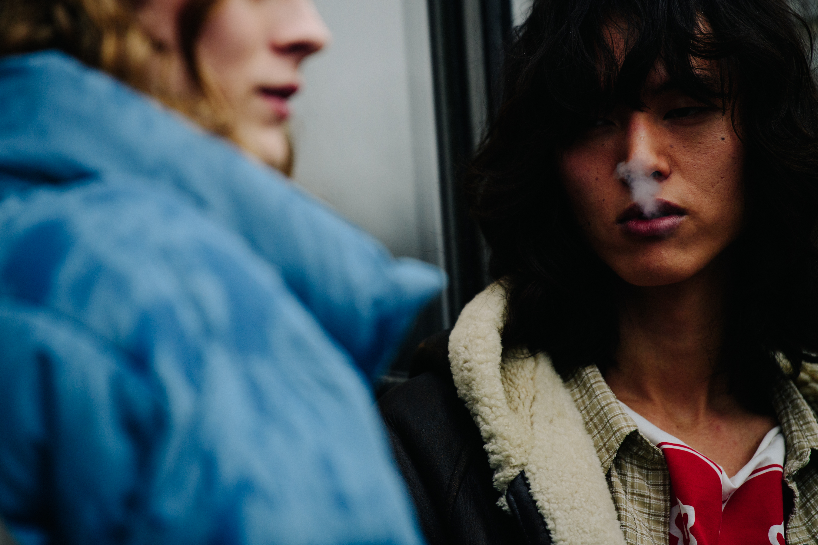 Models smoking in rain