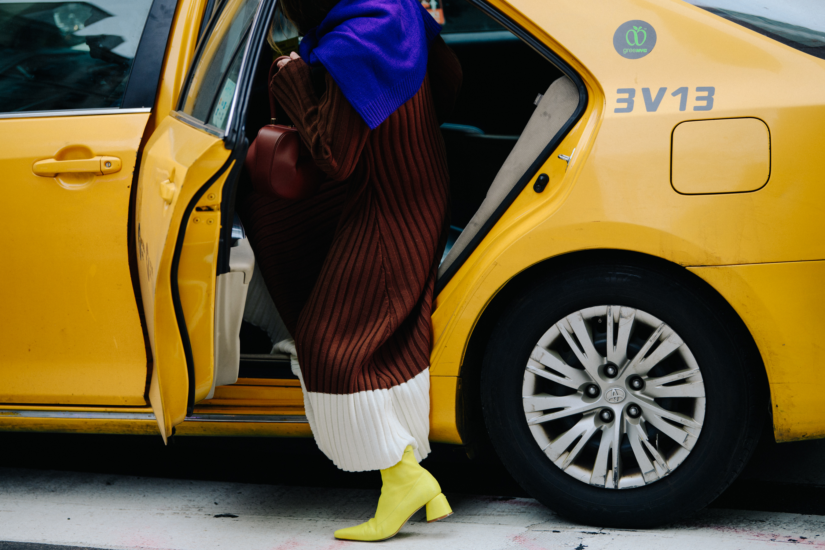 Woman wearing yellow heeled boots