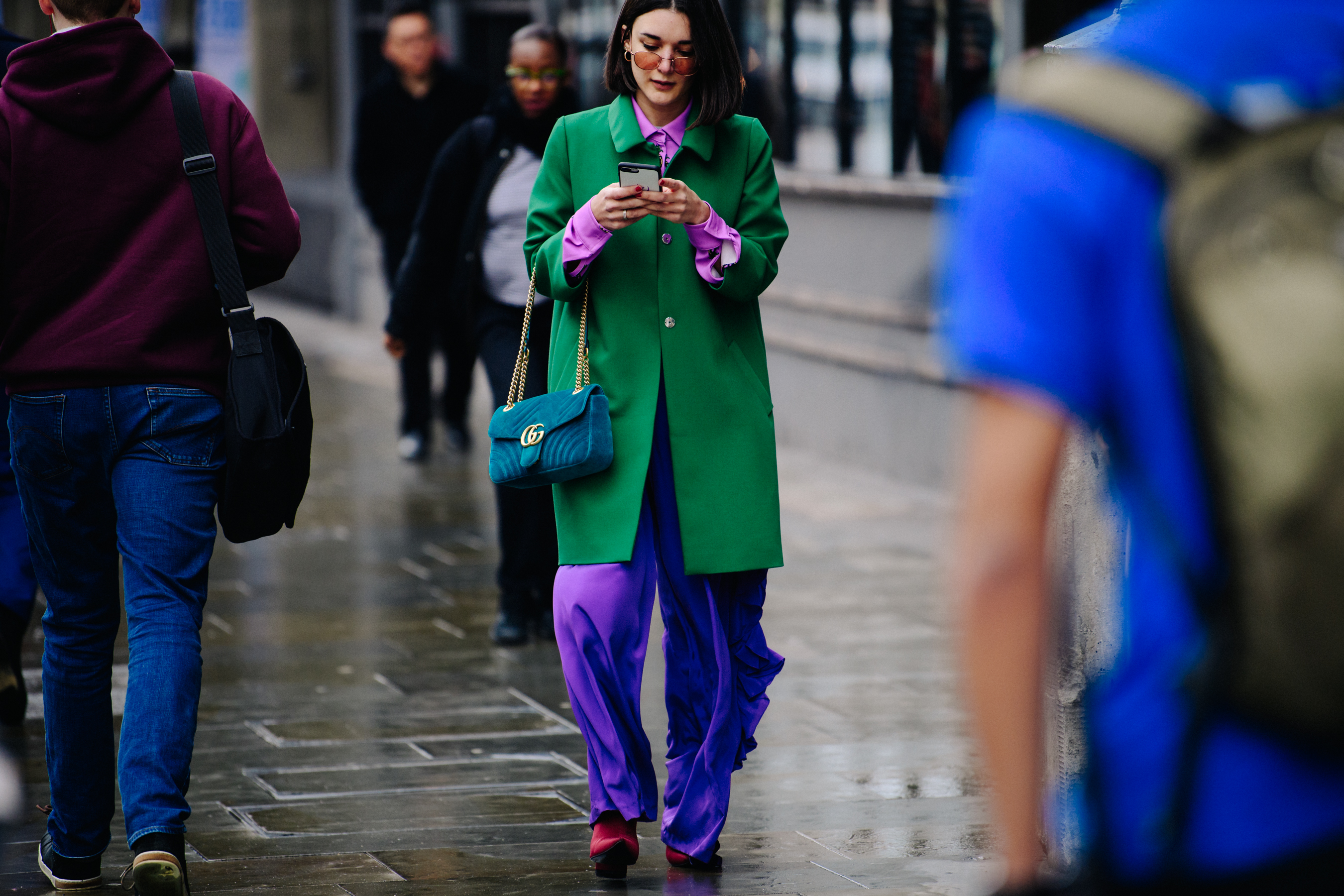 Woman wearing pink and green outfit