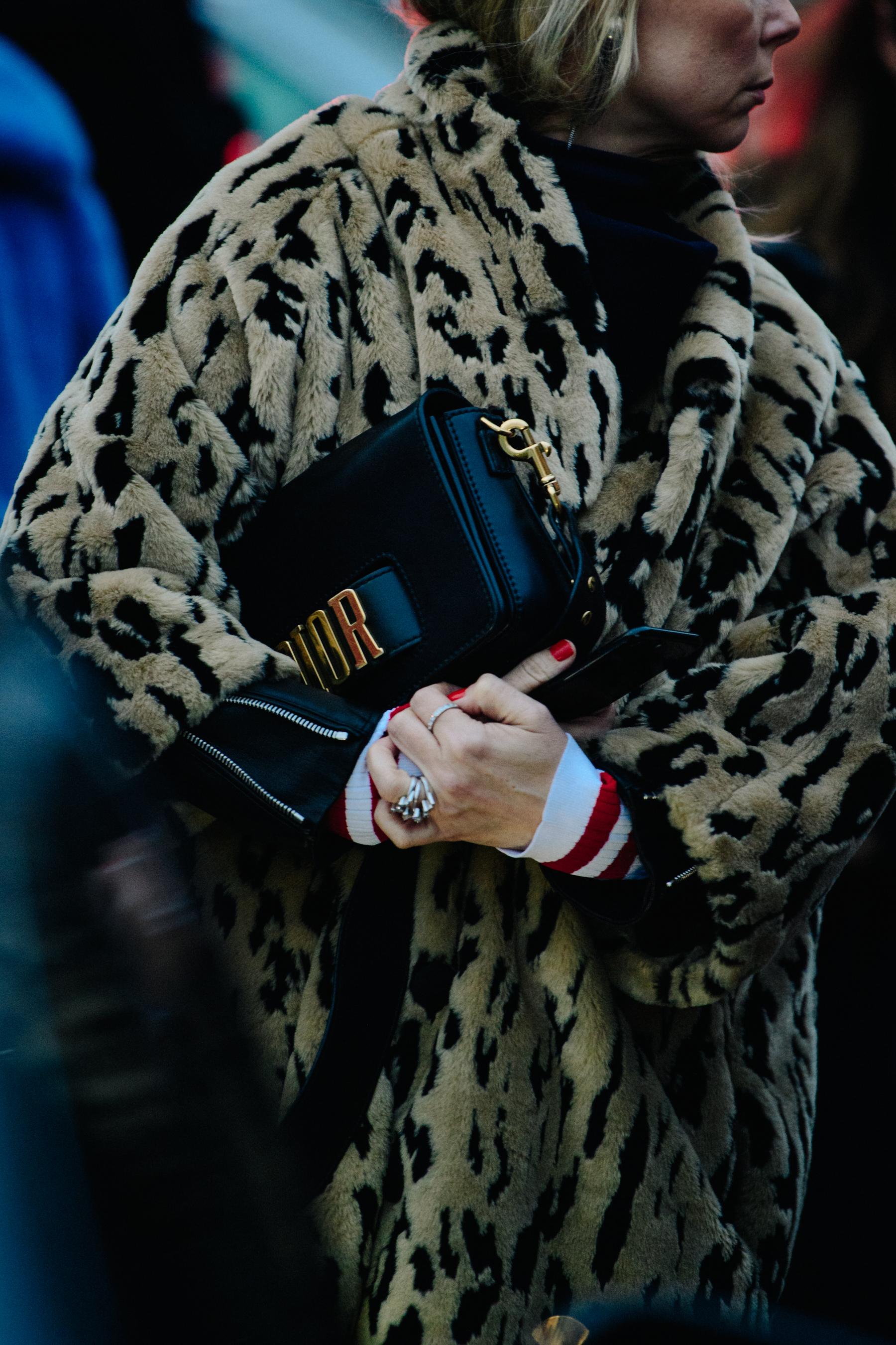 Woman holding Christian Dior bag