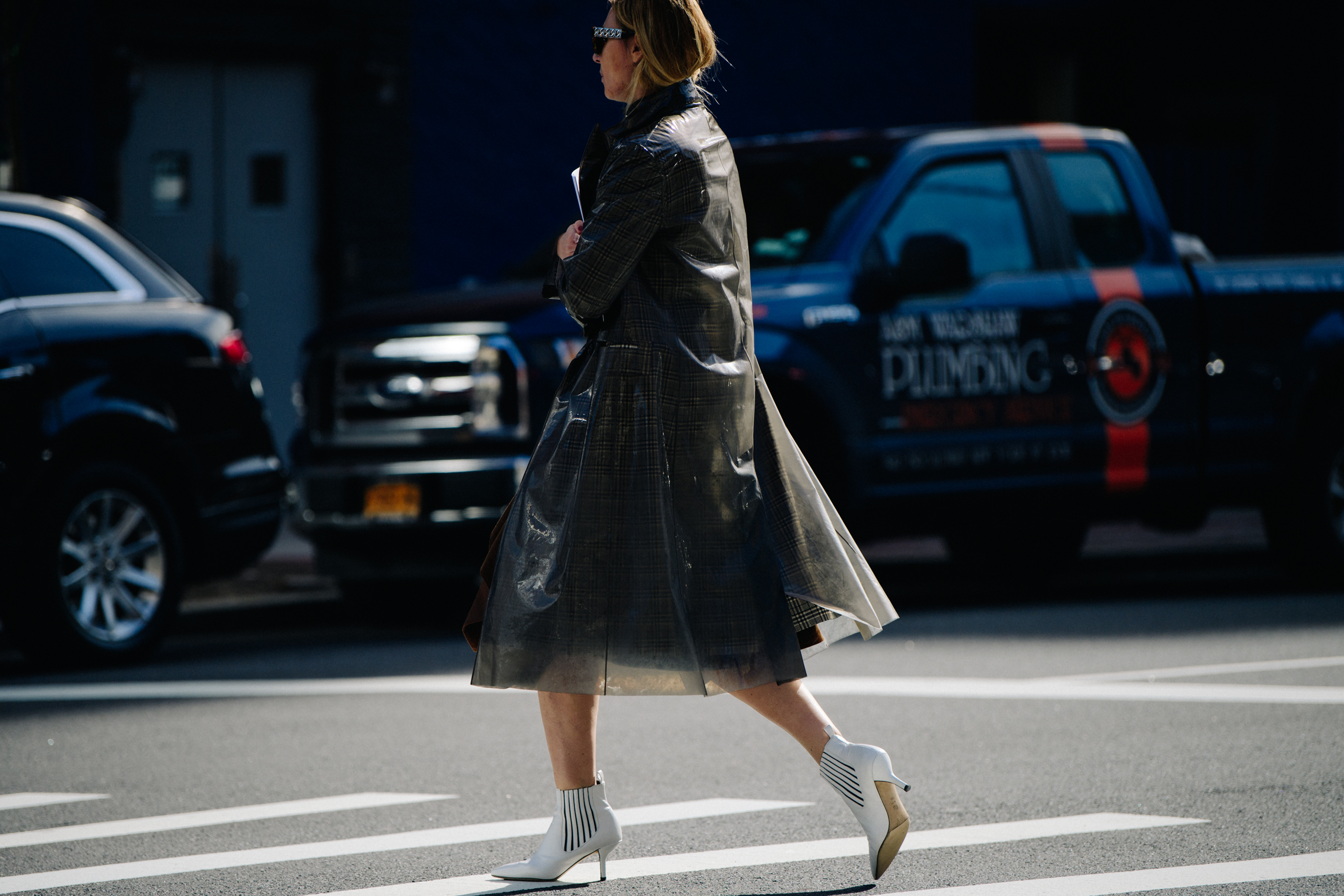 Woman wearing transparent coat