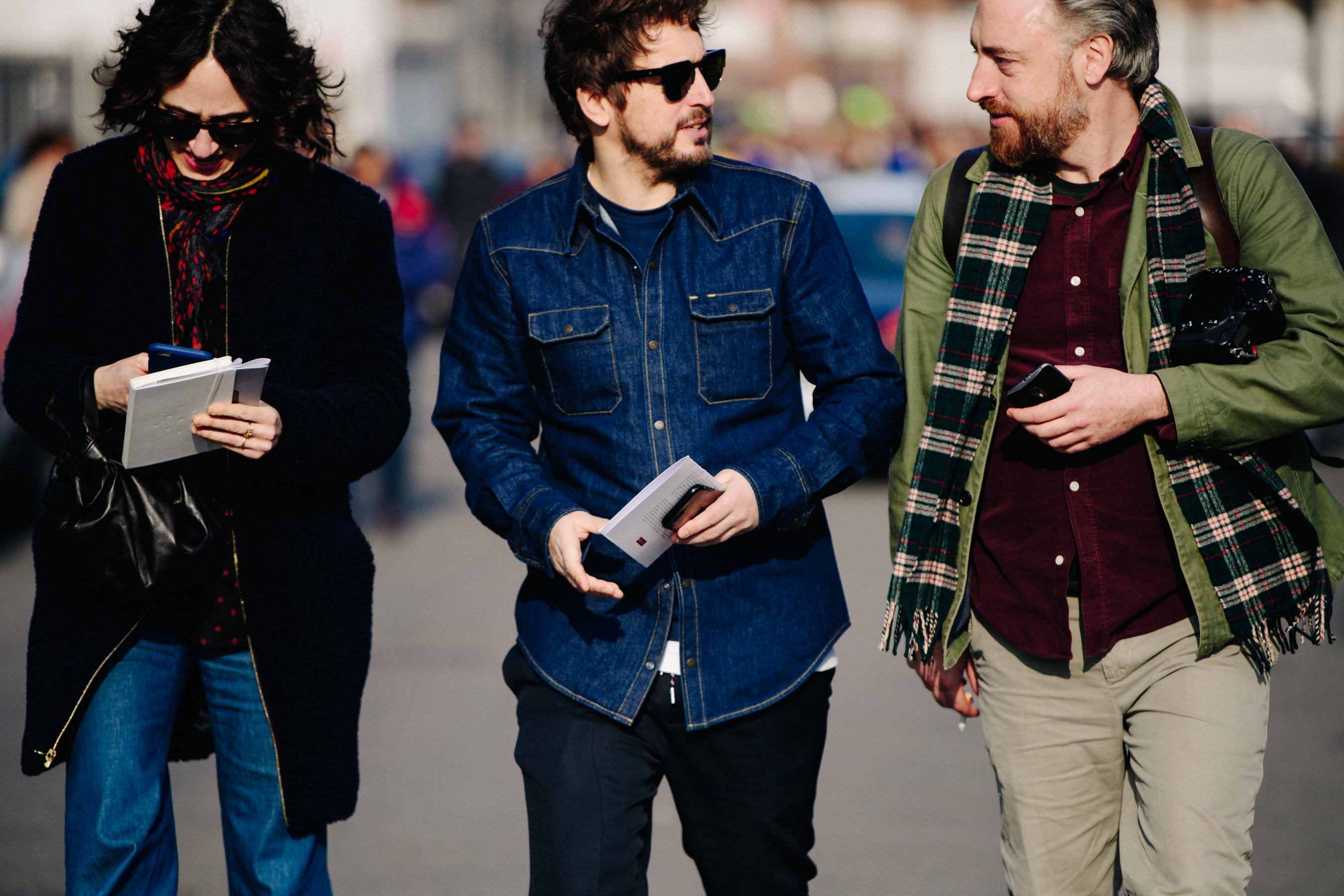 Two men wearing casual shirts