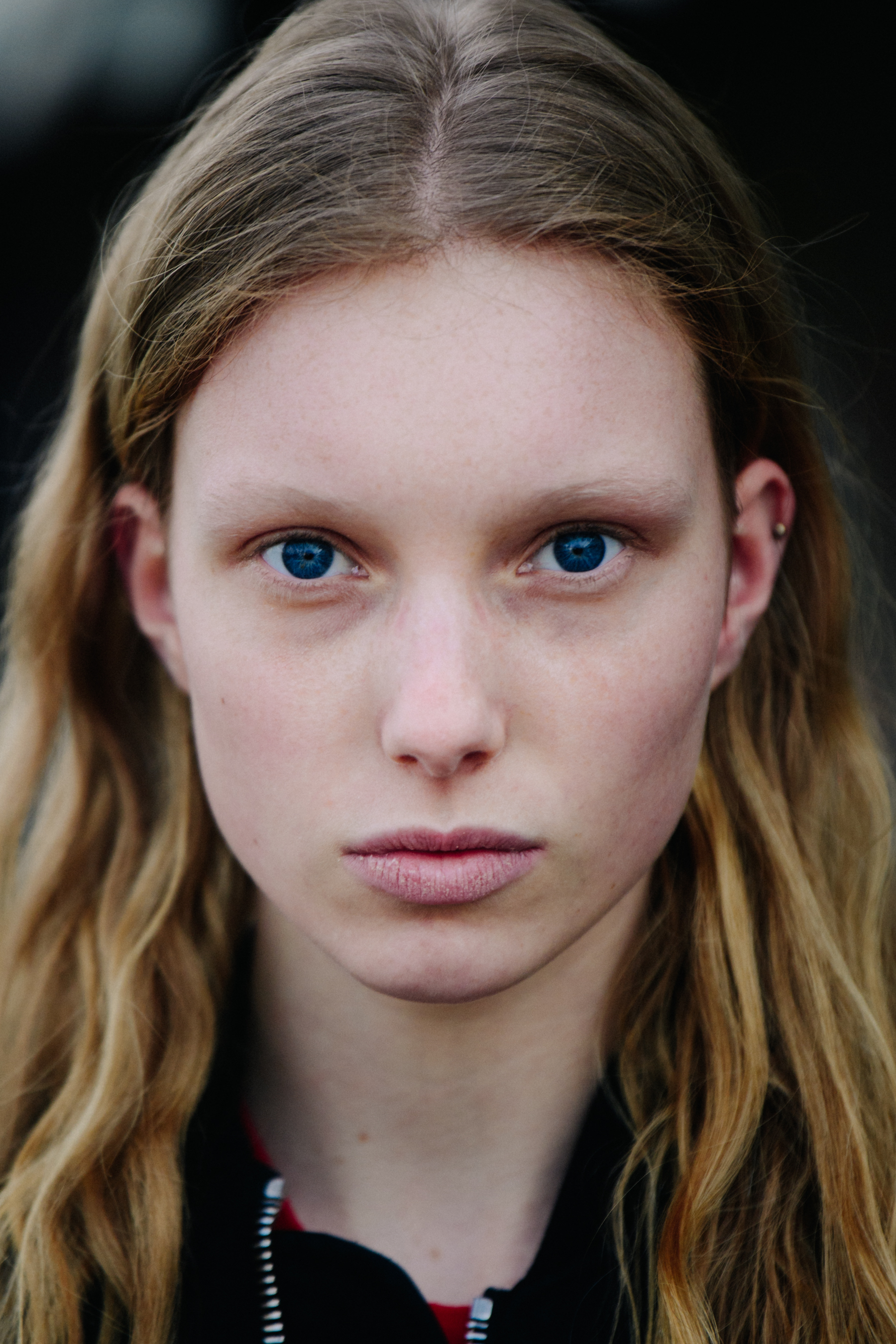 Portrait of blonde model with blue eyes