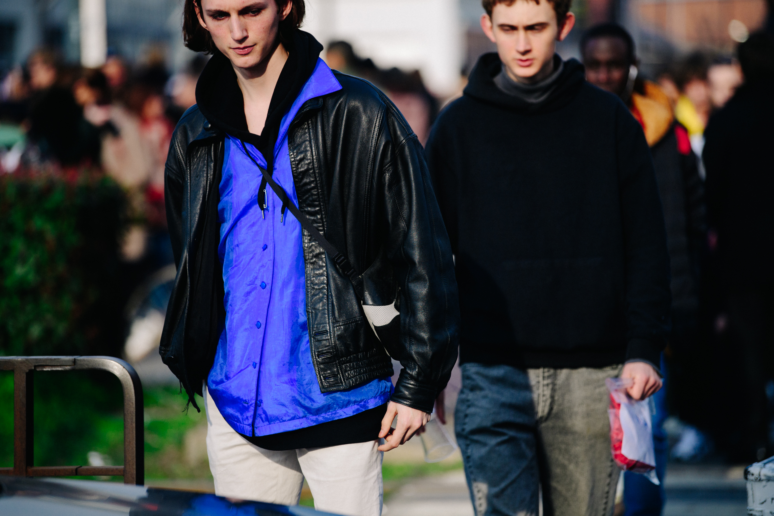 Two male models wearing black