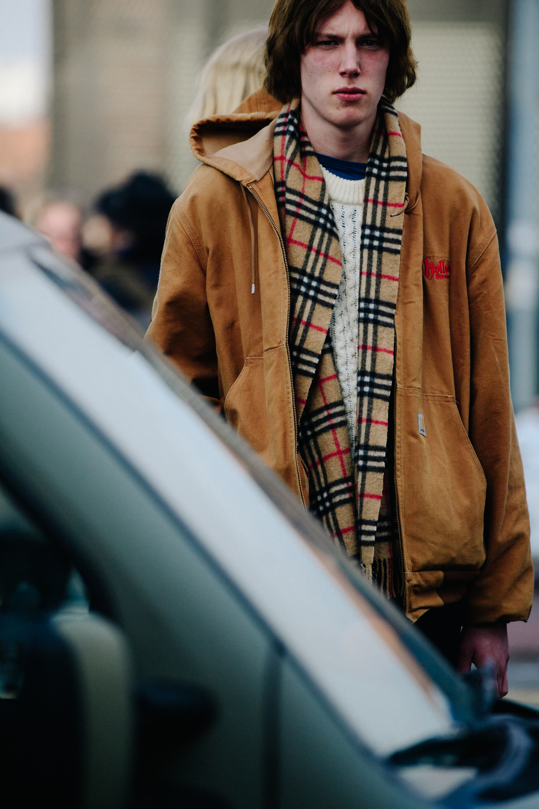 Male model wearing dark tan jacket