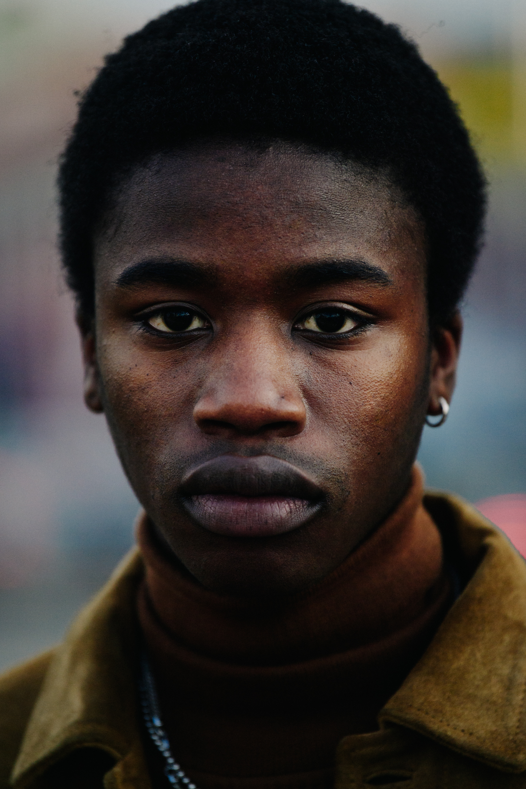 Portrait of male model with thick black hair