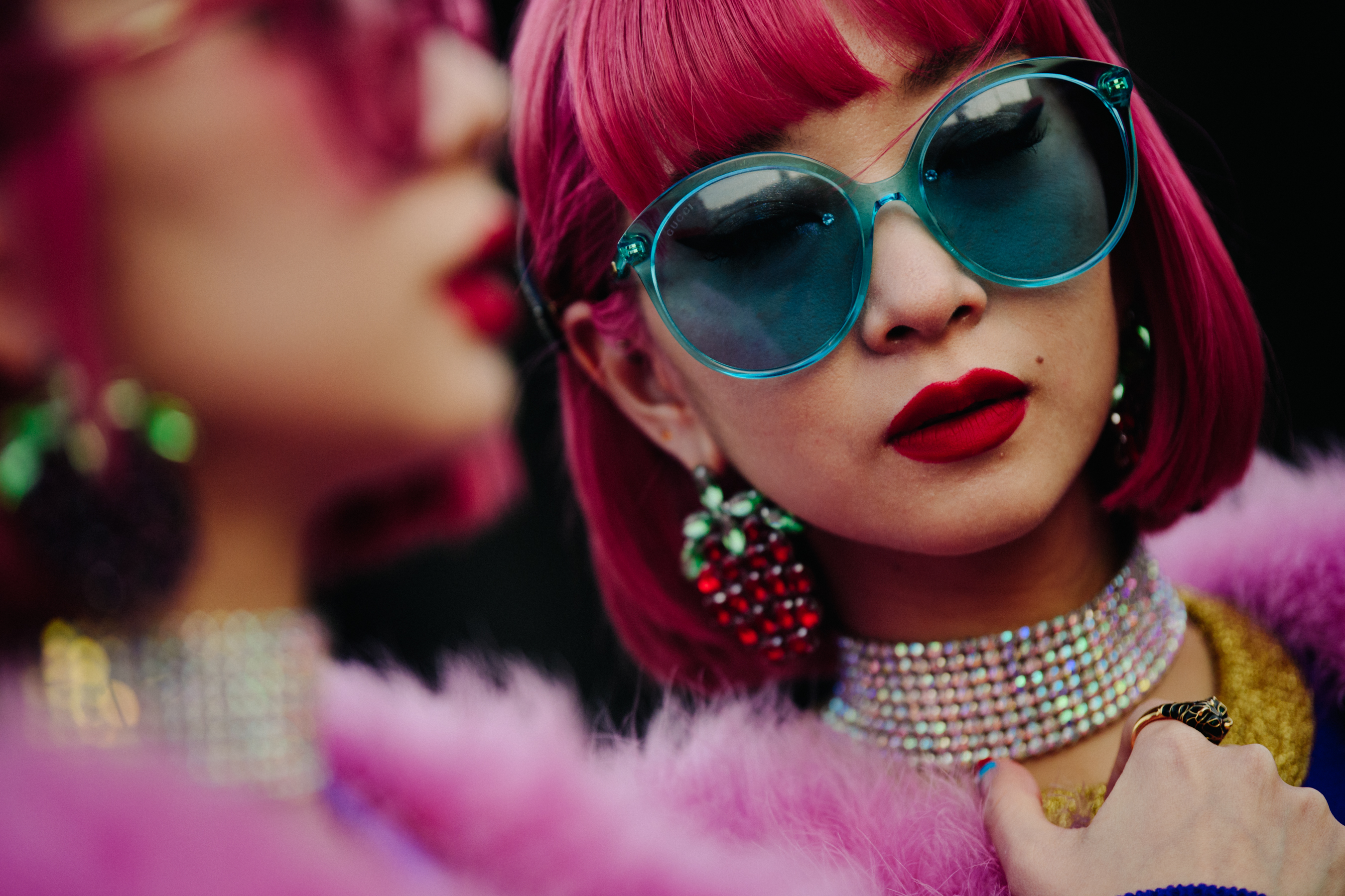 Two Asian women with pink hair