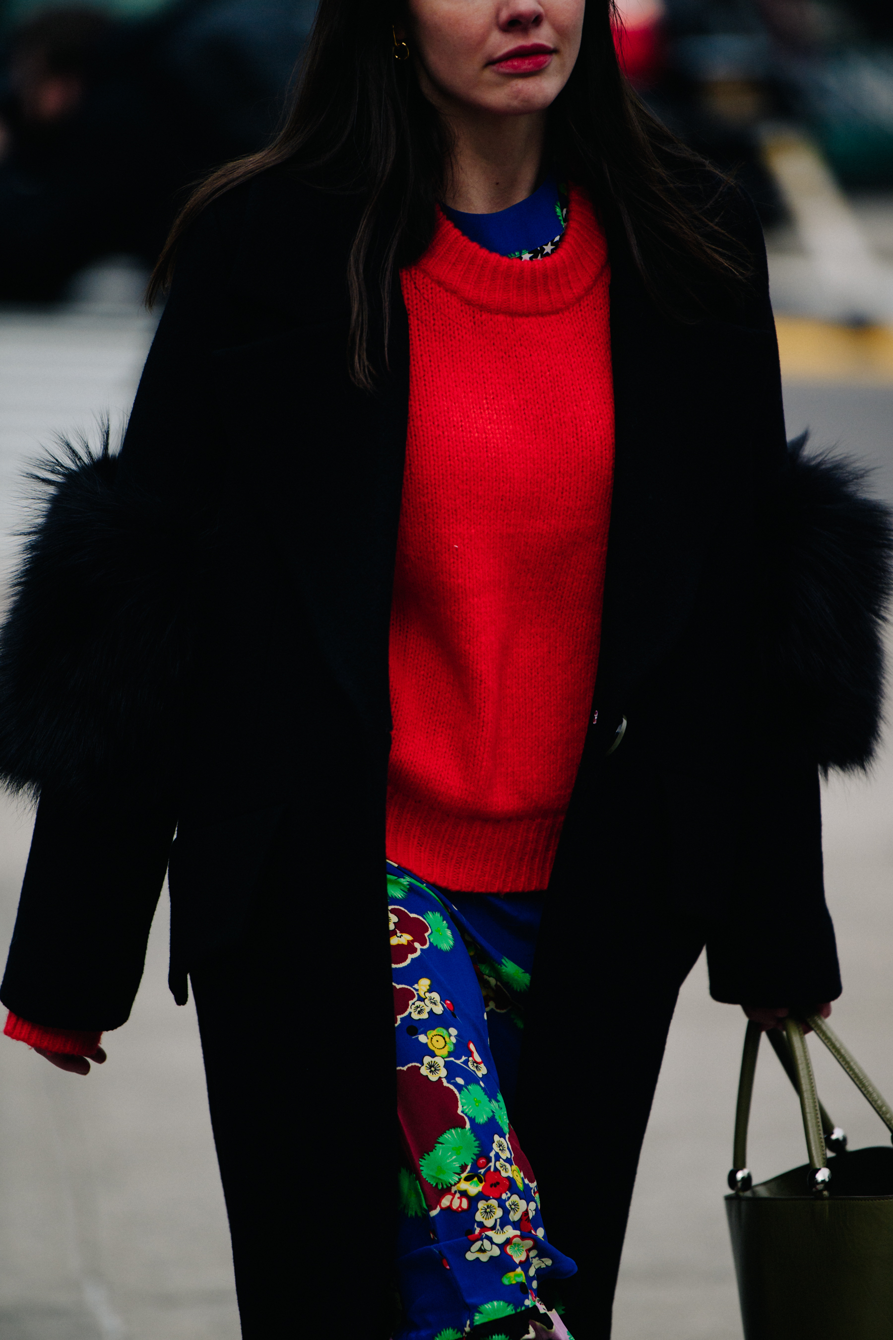 Woman wearing red knit jumper