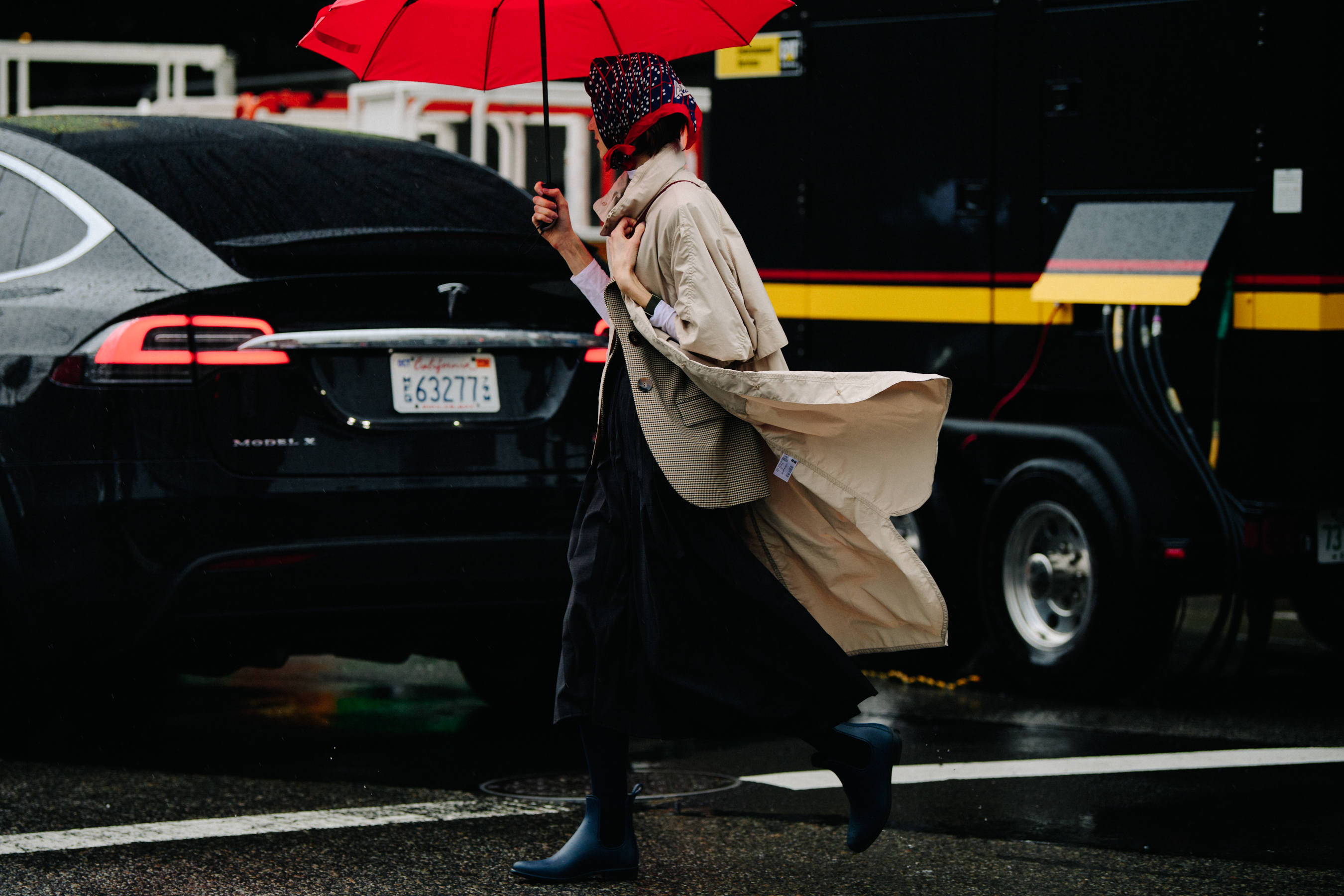 Woman wearing long blowing coat