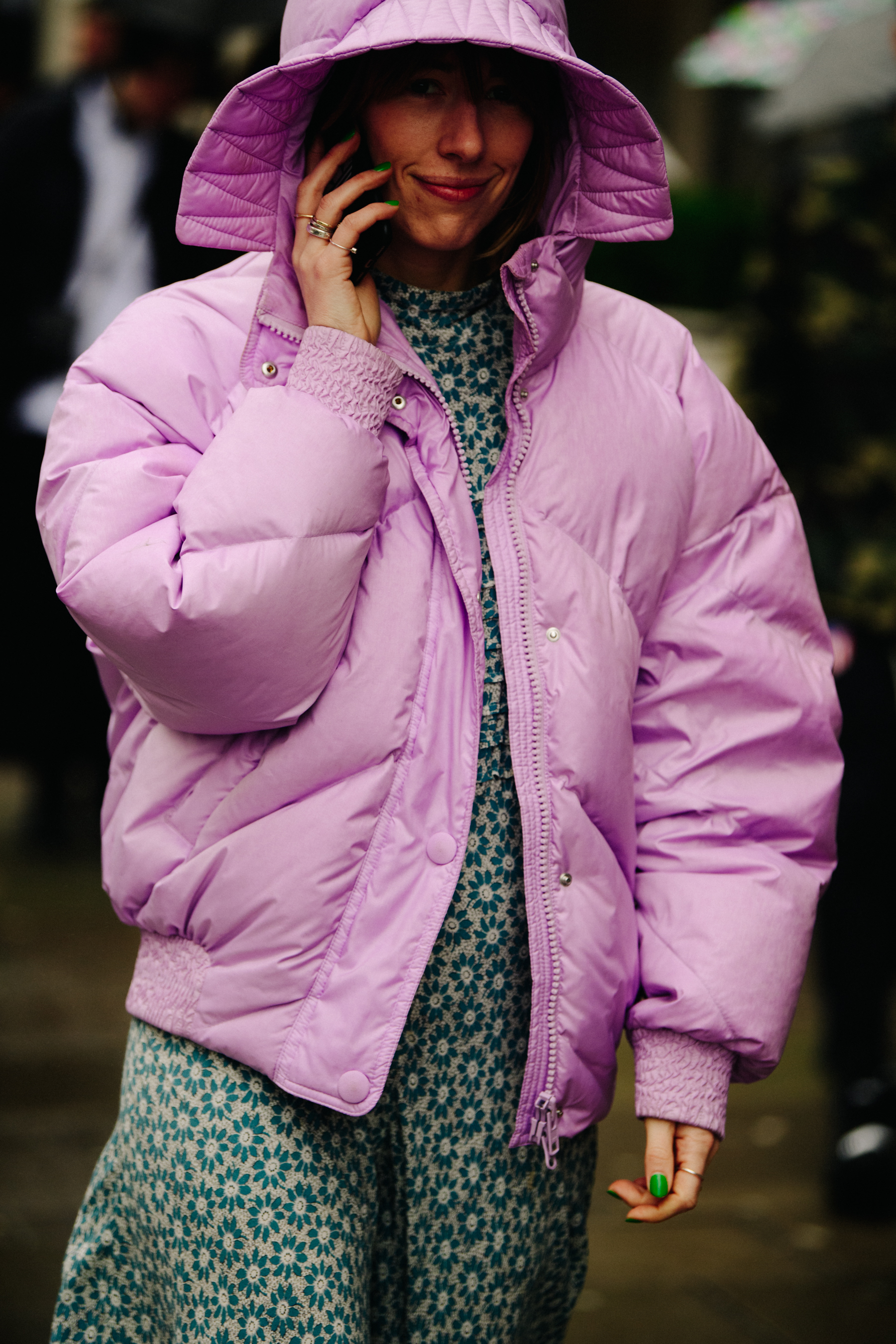 Woman wearing pink puffer coat