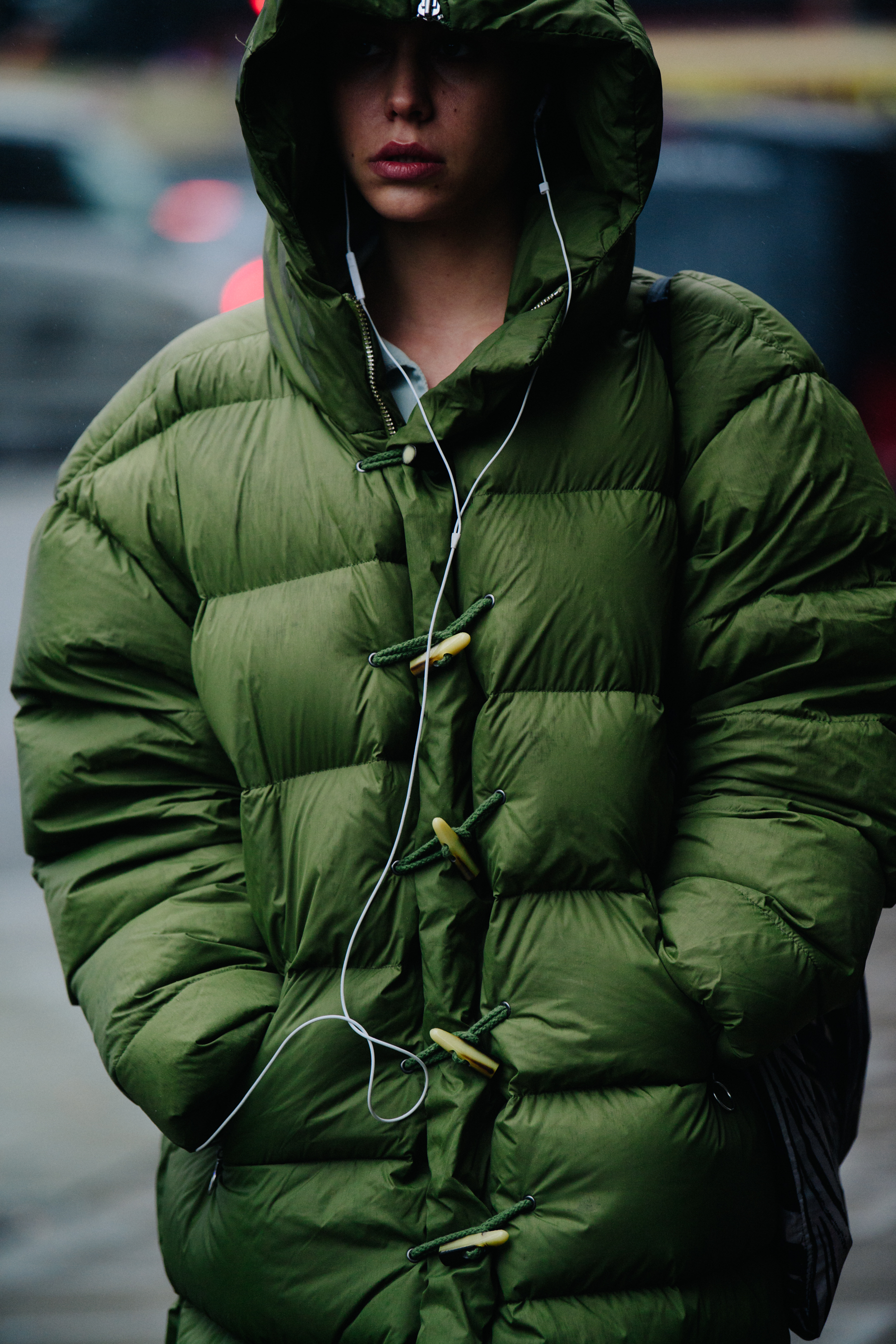 Woman wearing thick green coat