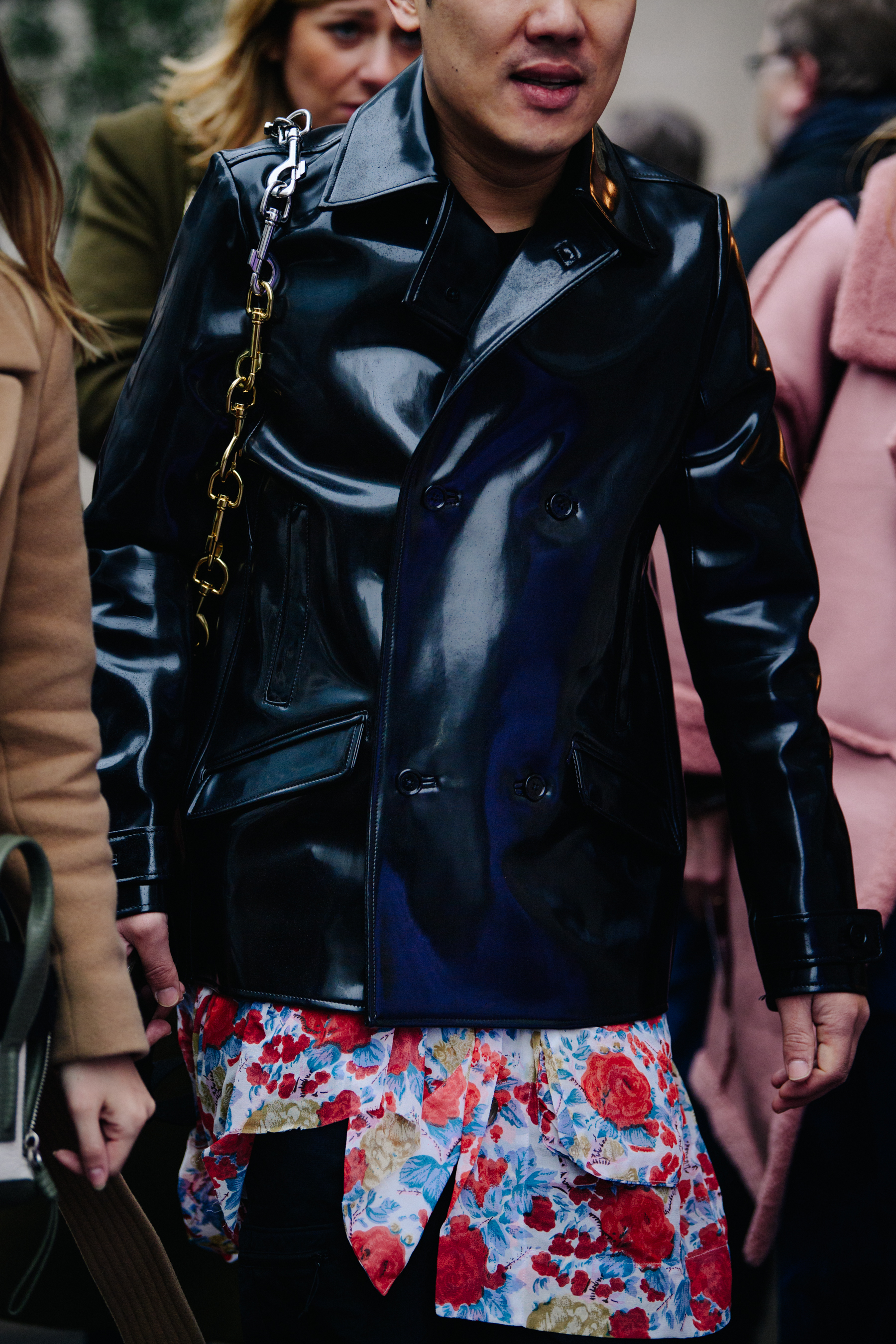Man wearing floral shirt under leather