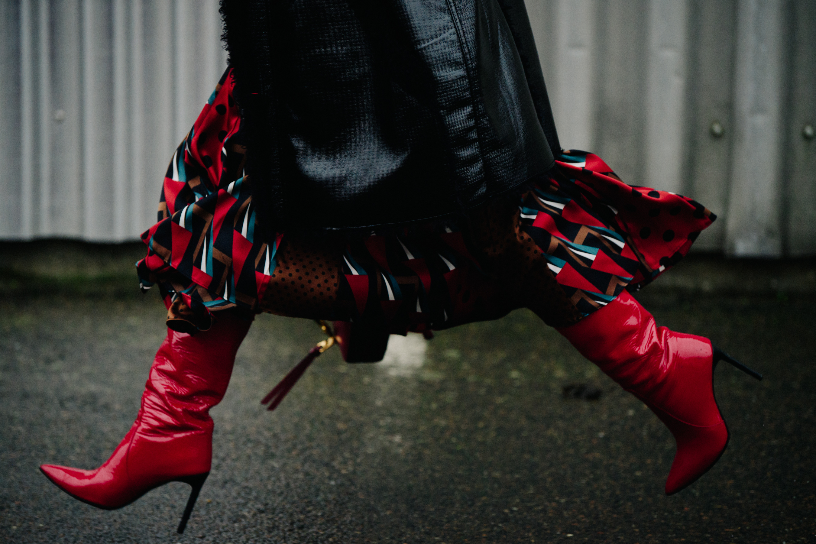 Woman wearing red heel boots