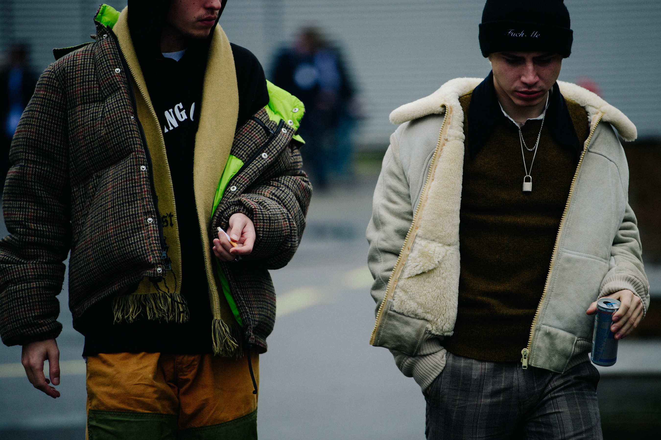 Two men wearing layered jackets