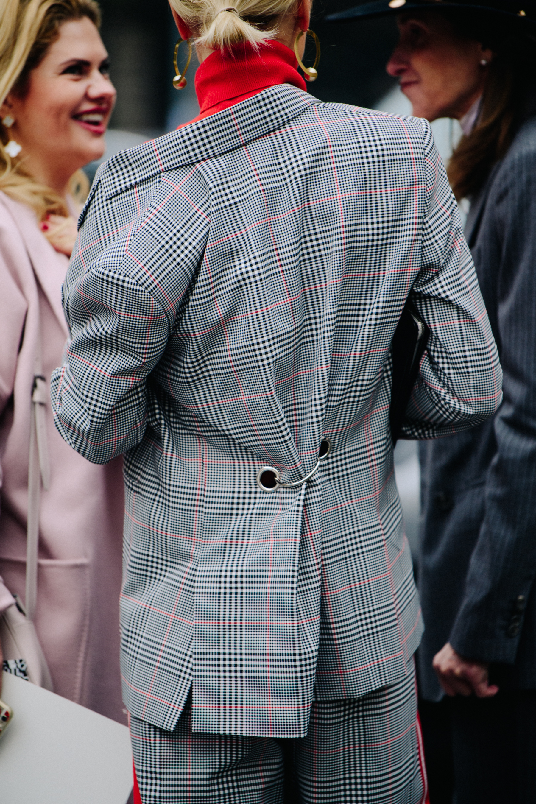 Woman wearing grey suit