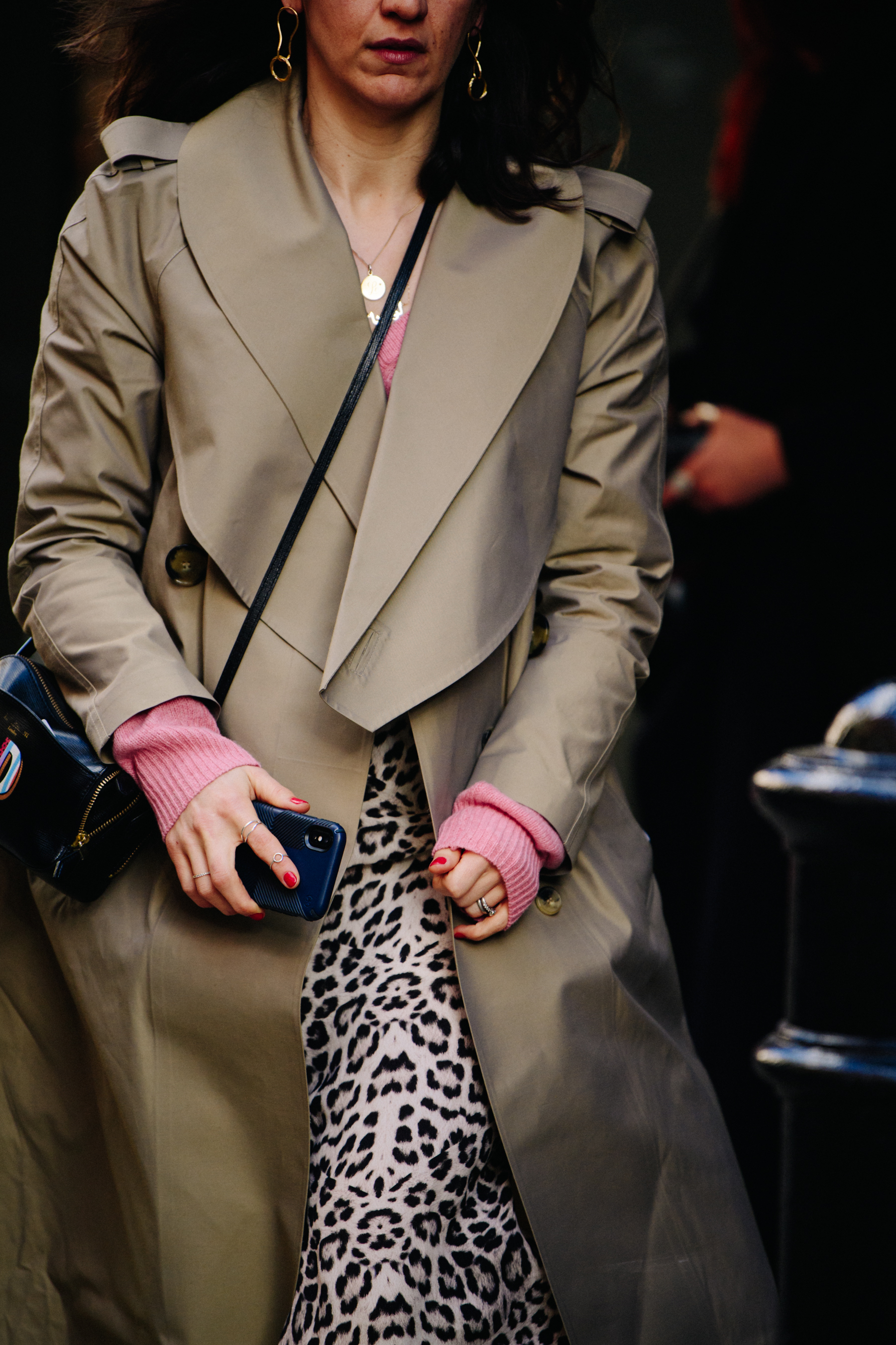 Woman wearing tan coat